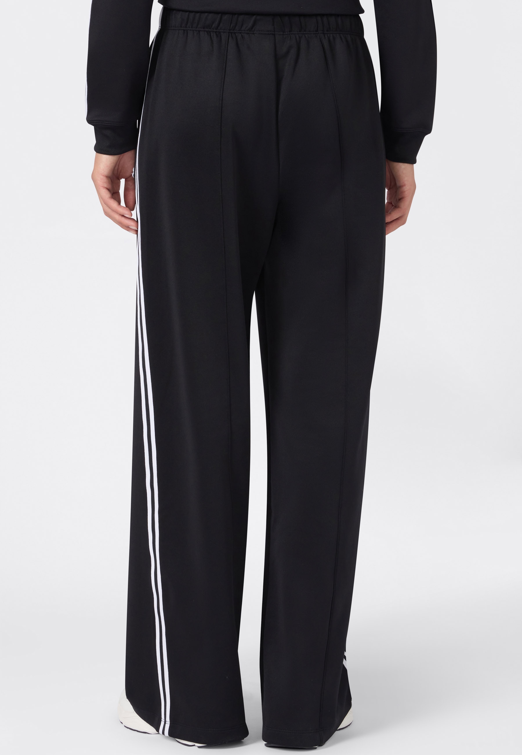 Champion Pantalon de jogging »SPORTWEAR TRACK PANTS Loose Fit«  avec une coupe ample, stable en forme, flexible