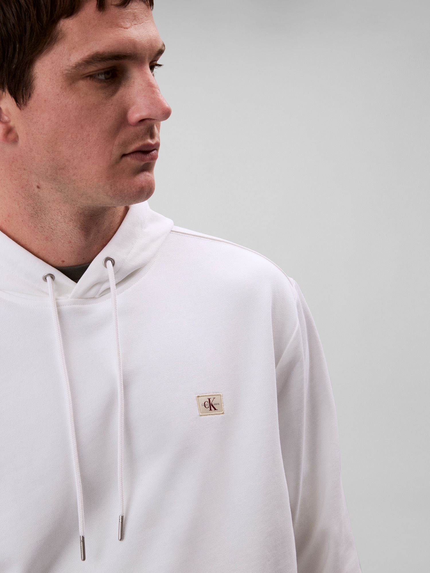 Calvin Klein Jeans Sweat à capuche »400GSM TERRY BADGE HOODIE«, Mit Rundhalsausschnitt
