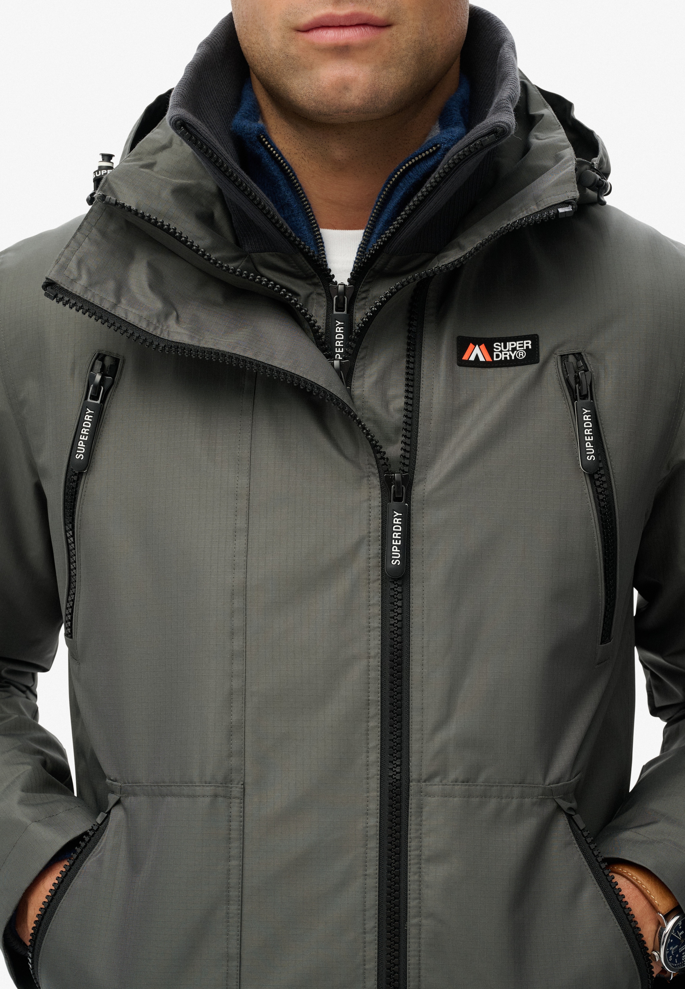 Superdry Veste d'extérieur »HOODED MTN WINDBREAKER JACKET« mit Kapuze