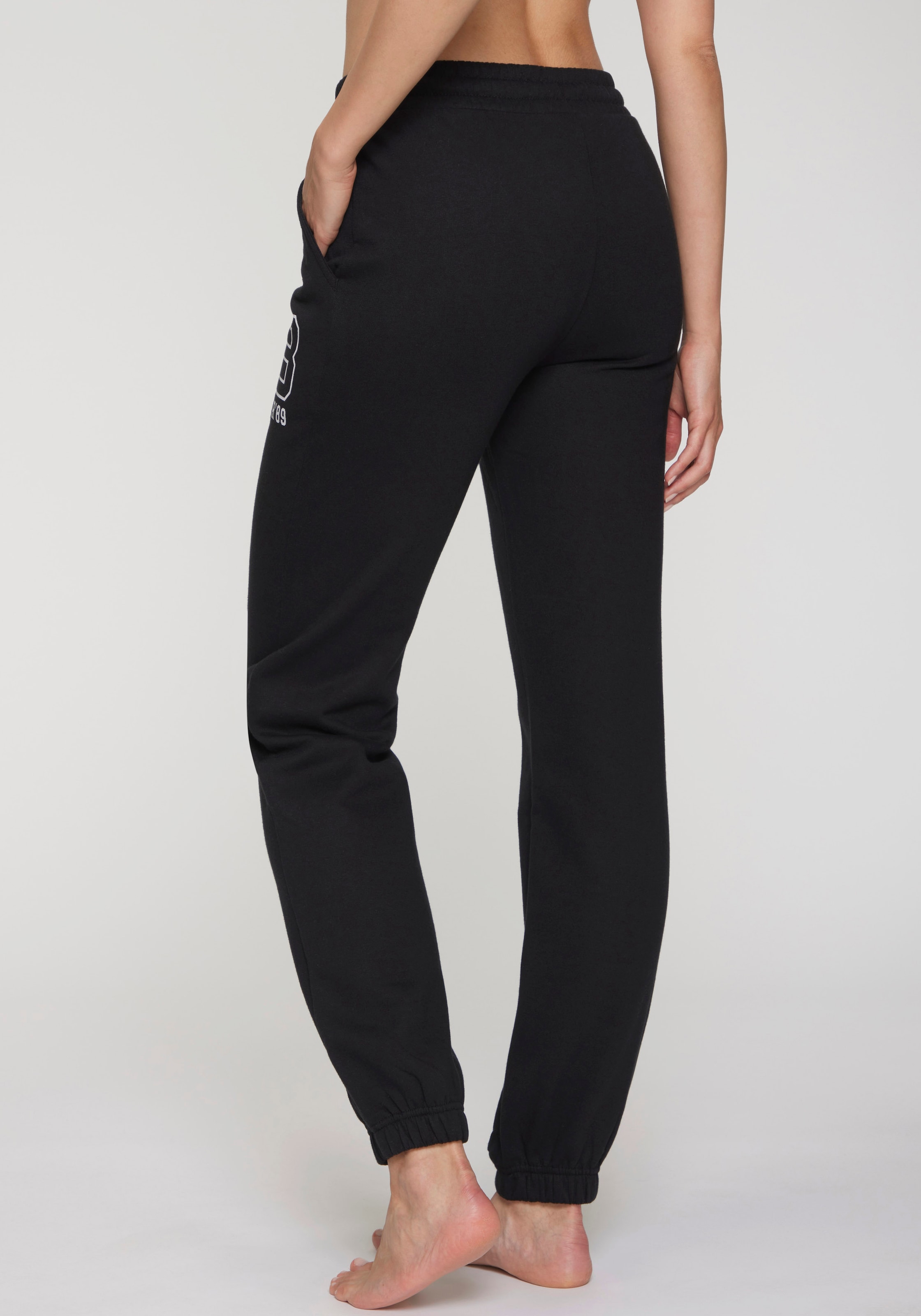 Bench. Loungewear Pantalon de jogging  avec poches latérales et impression logo, vêtements d'intérieur