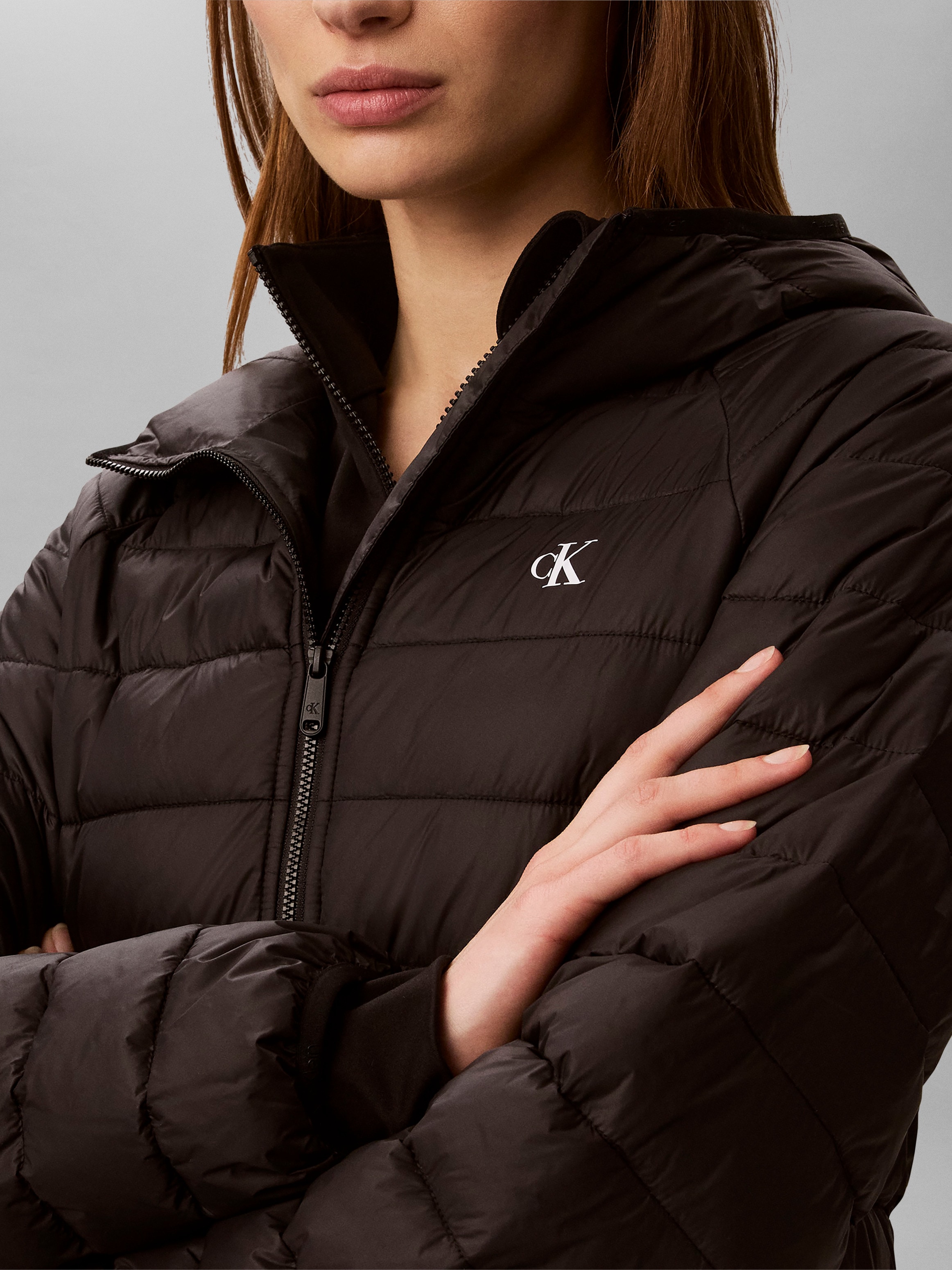 Calvin Klein Jeans Veste matelassée »ULW SHORT CK PACKABLE PUFFER JAC« mit Kapuze in kurzer Passform