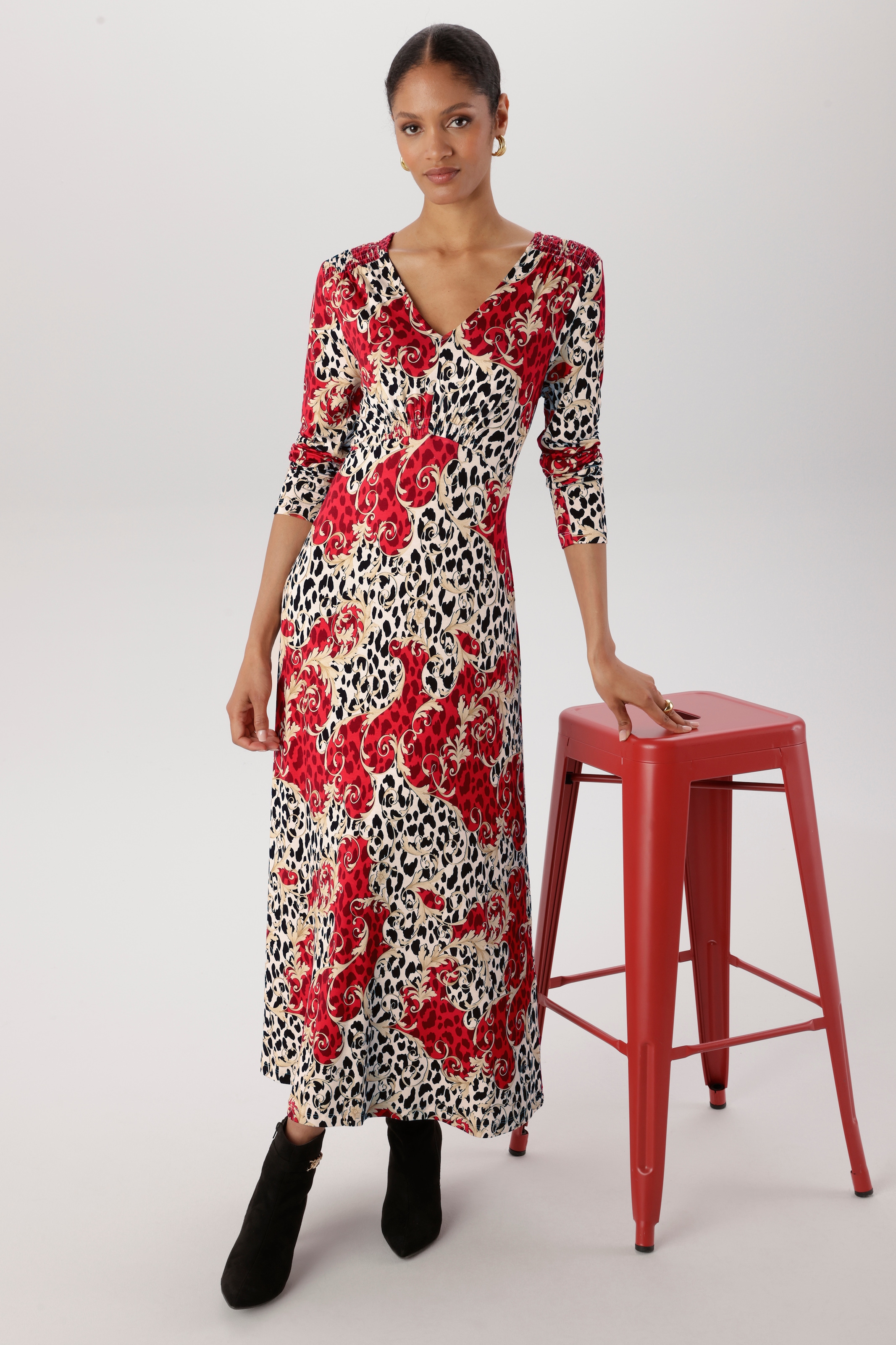 Aniston SELECTED Robe midi avec des détails à smock et un imprimé léopard fantaisiste