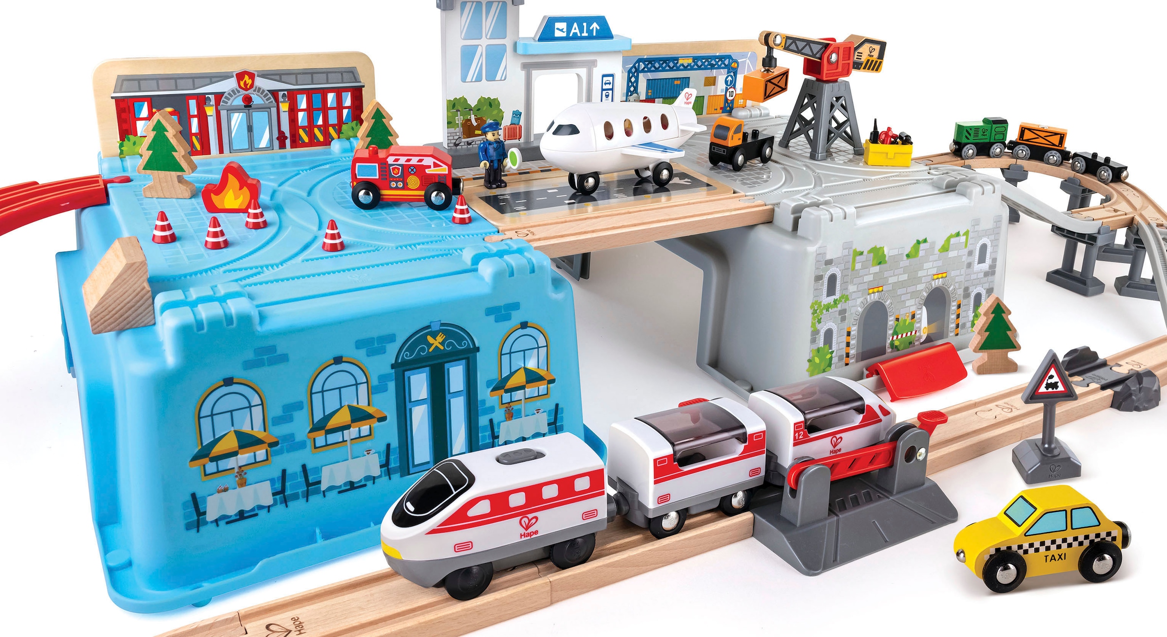 Hape Train jouet »Grossstadtlandschaft Eisenbahn in Aufbewahrungsbox«