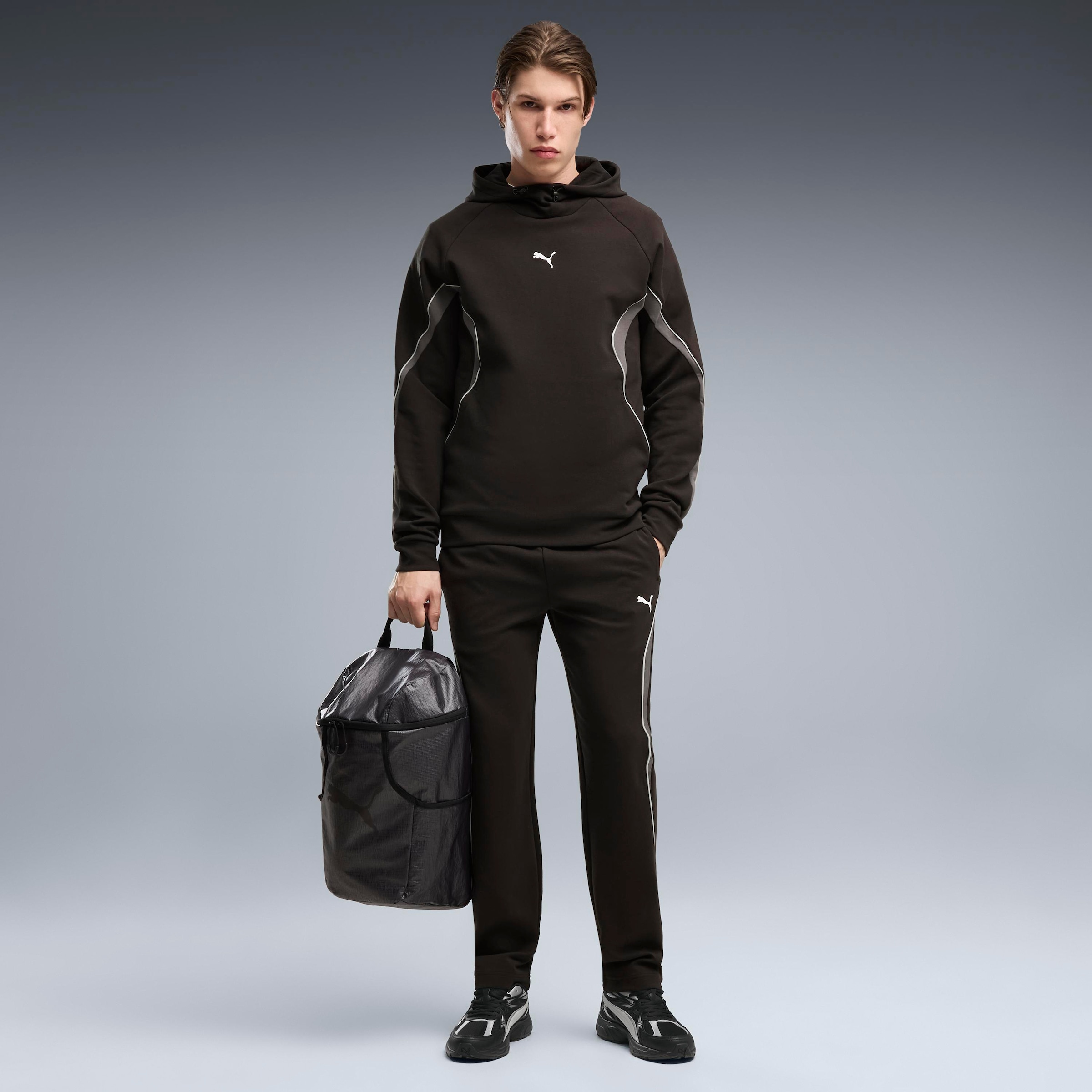 PUMA Pantalon de survêtement »SPORT BLOCKING SWEATPANTS DK OP«  avec poches fendues, uni, coupe régulière, taille normale
