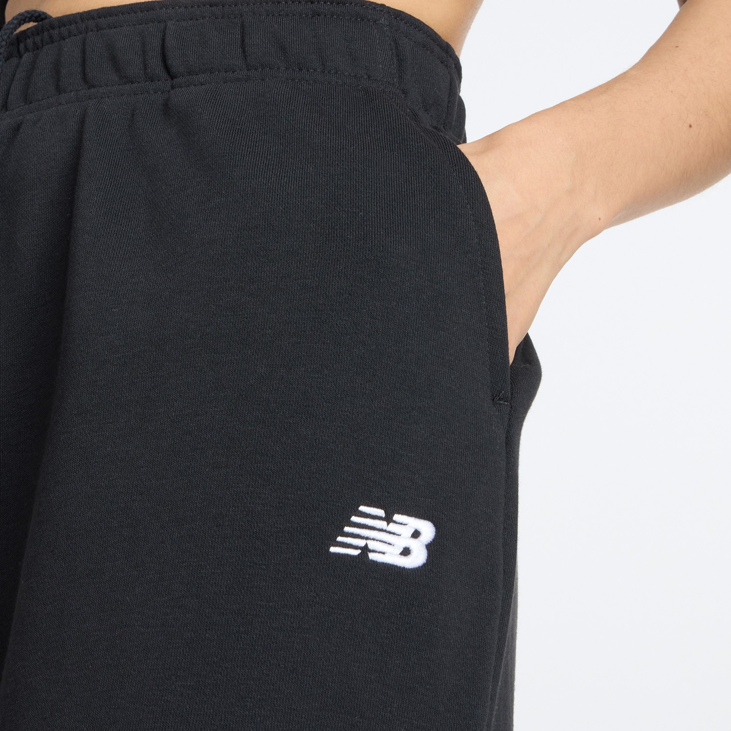 New Balance Pantalon de jogging »SPORT ESSENTIALS FRENCH TERRY JOGGER«  lockere Passform