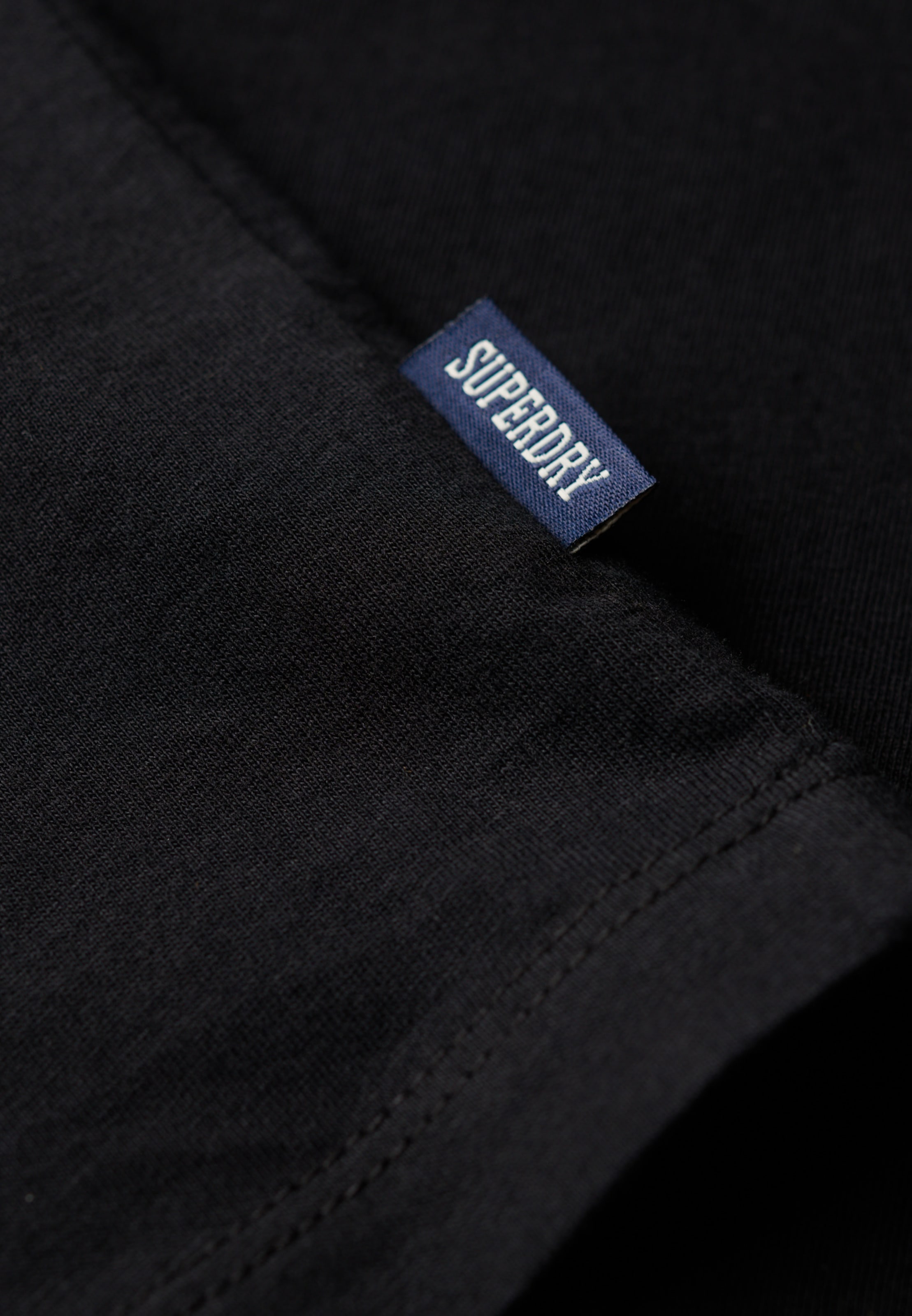 Superdry Débardeur »ESSENTIAL LOGO VEST UB« avec étiquette de marque, en coton et jersey simple, coupe slim, sans manches