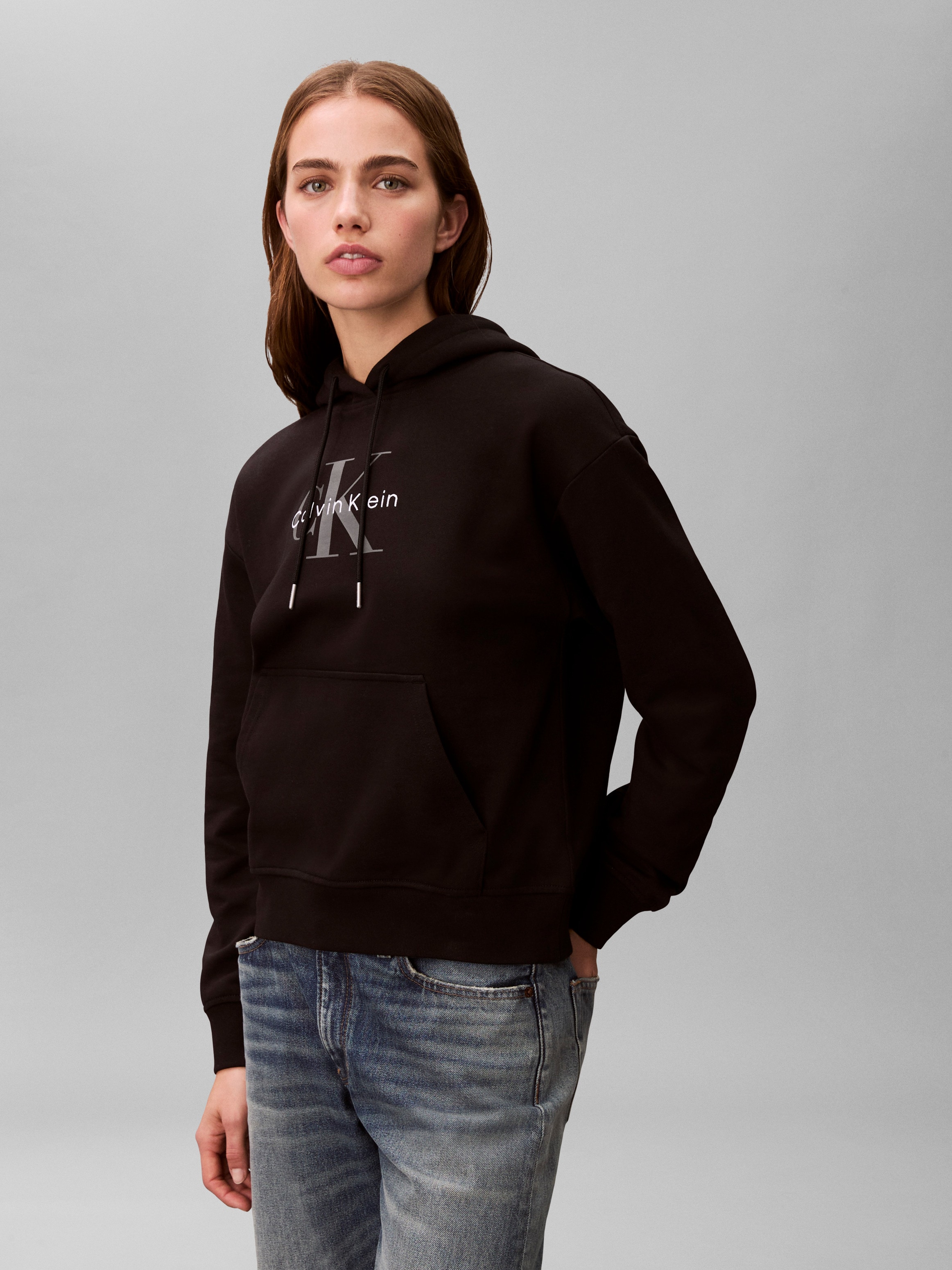 Calvin Klein Jeans Kapuzensweatshirt »MONOLOGO«, Regular fit mit Kapuze und Kängurutasche
