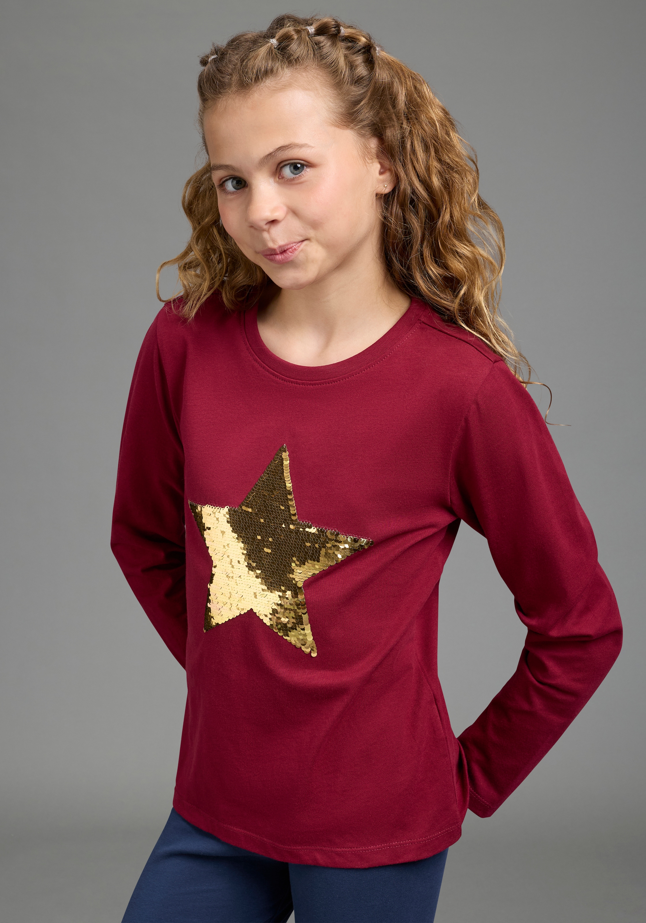 KIDSWORLD Langarmshirt »mit STERN Applikation« Langarm,  taillierter Schnitt,  mit glitzernden Pailletten