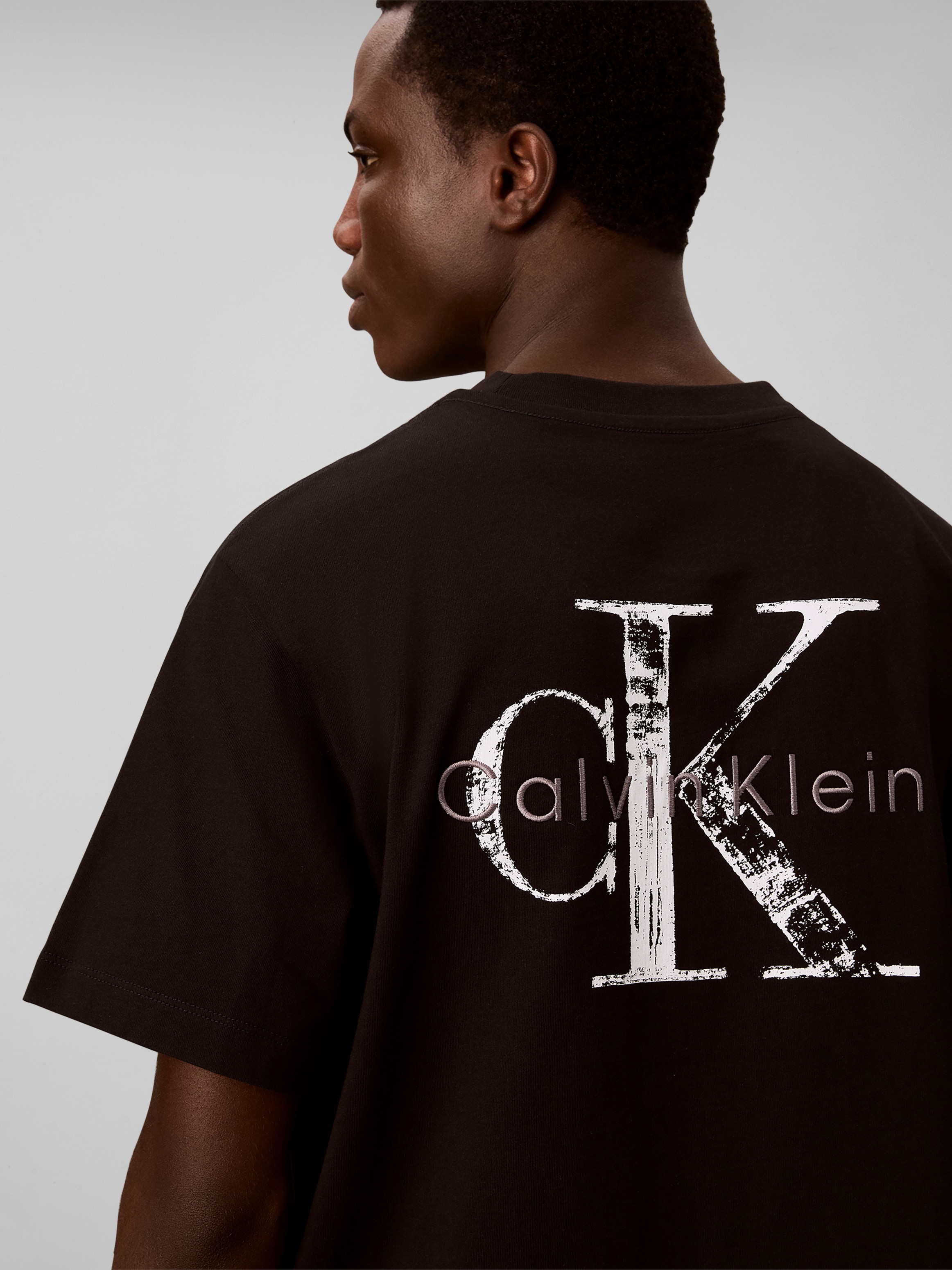 Calvin Klein Jeans T-Shirt »DISTRESS MONOLOGO« Regular fit mit Rückenprint