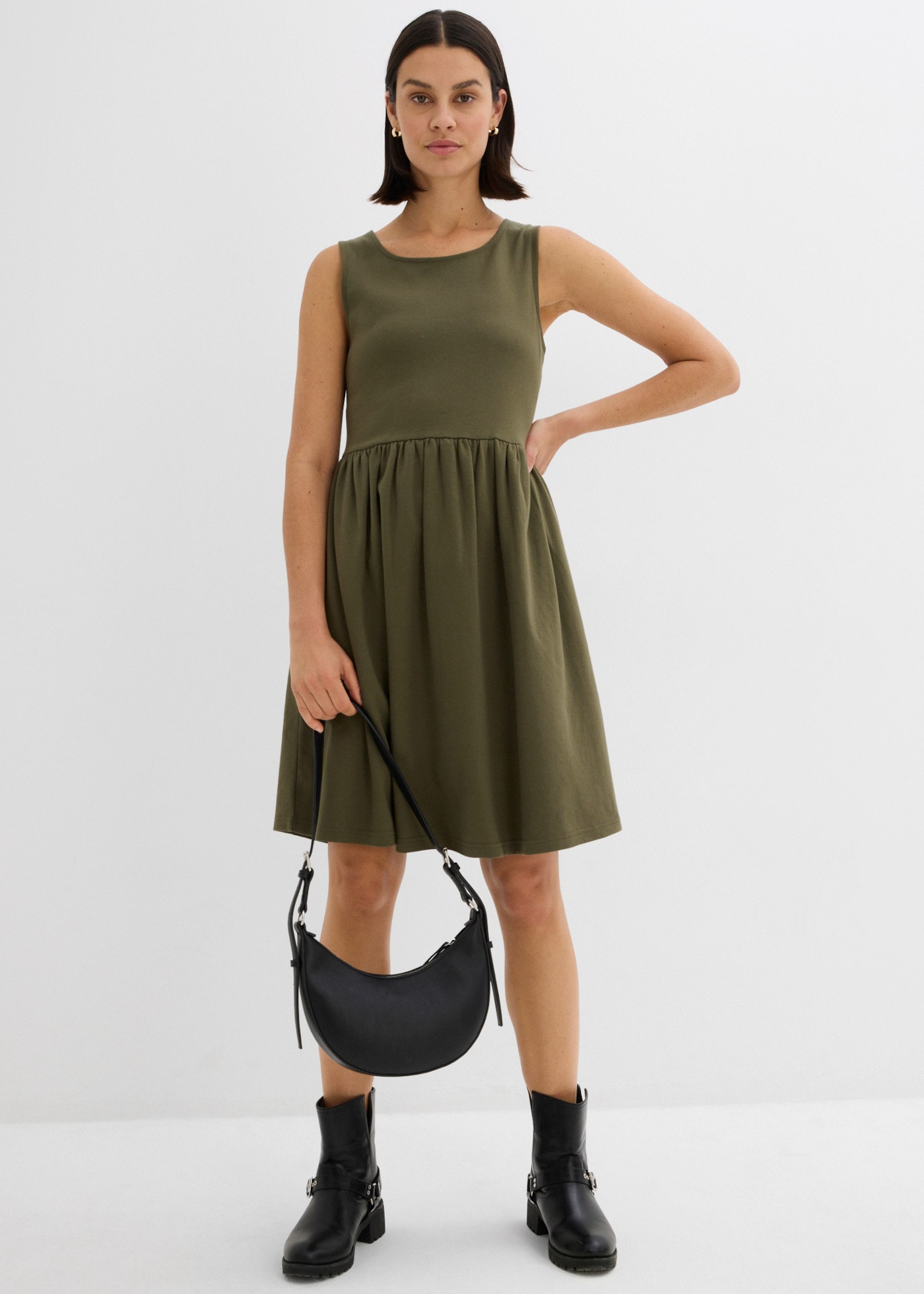 bonprix Robe t-shirt coupe confortable, sans manches, avec poches fendues, en coton