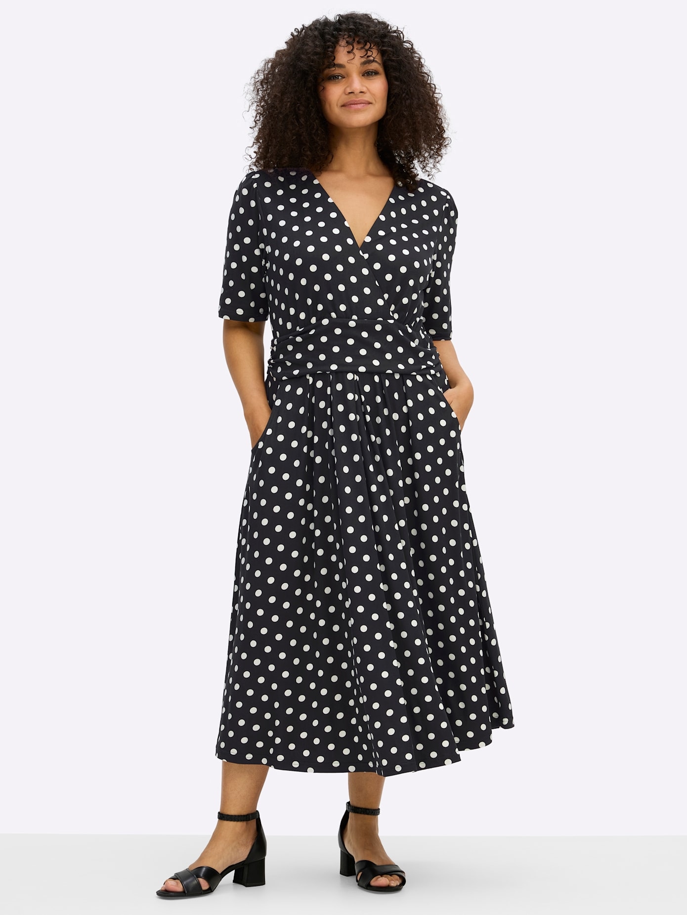 sheego by Joe Browns Robe en jersey »Jersey-Kleid« Poches pour les mains