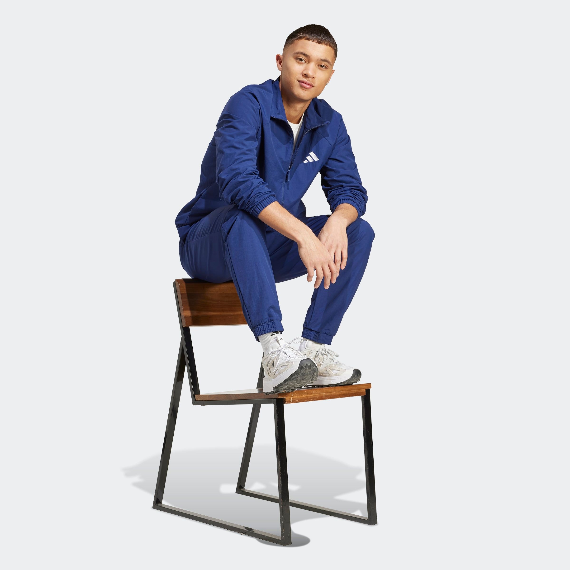 adidas Sportswear Coupe-vent »ESSENTIAL MIT KLEINEM LOGO«