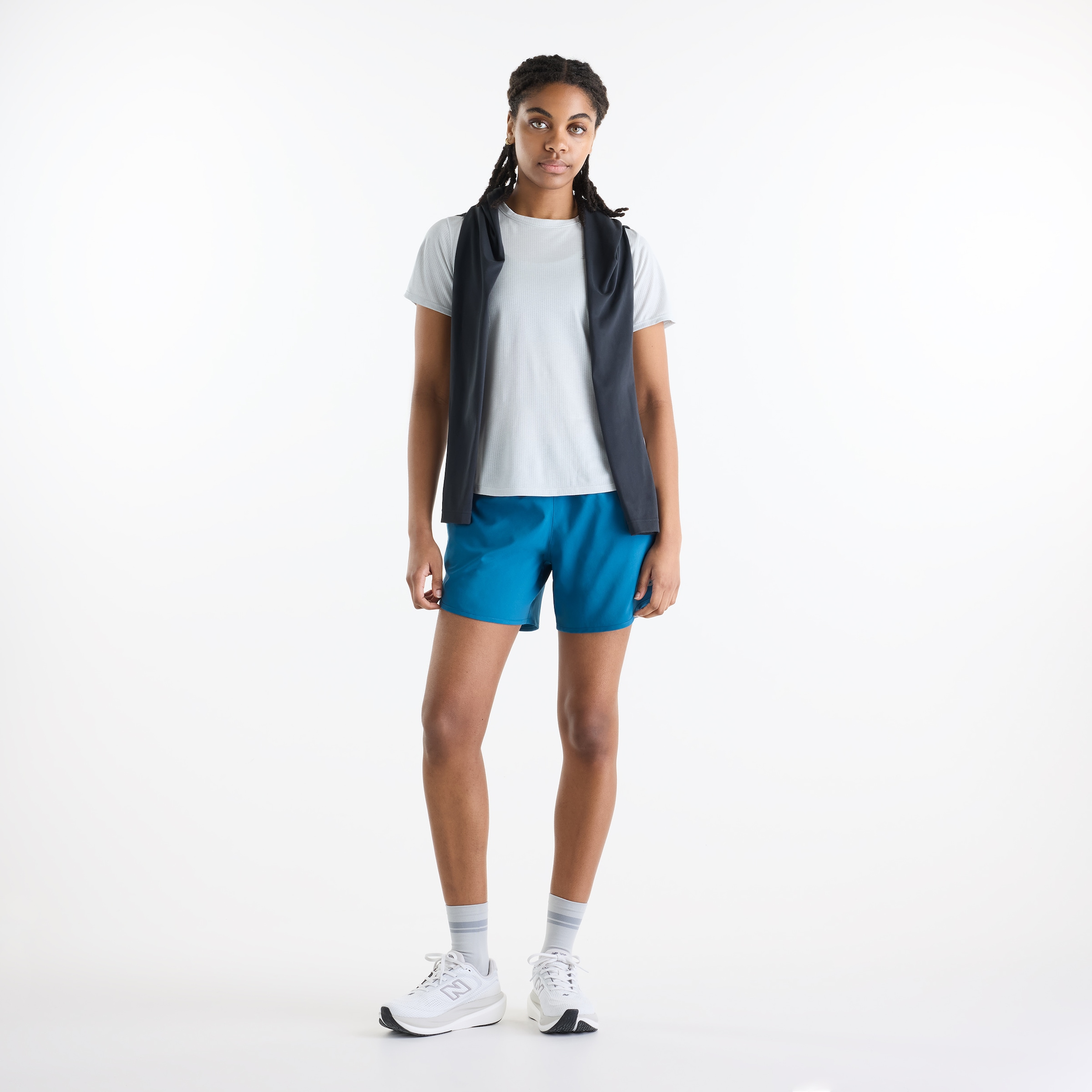 New Balance Short de course »SPORT ESSENTIAL SHORT 5«  avec poches latérales, en matière stretch, respirant