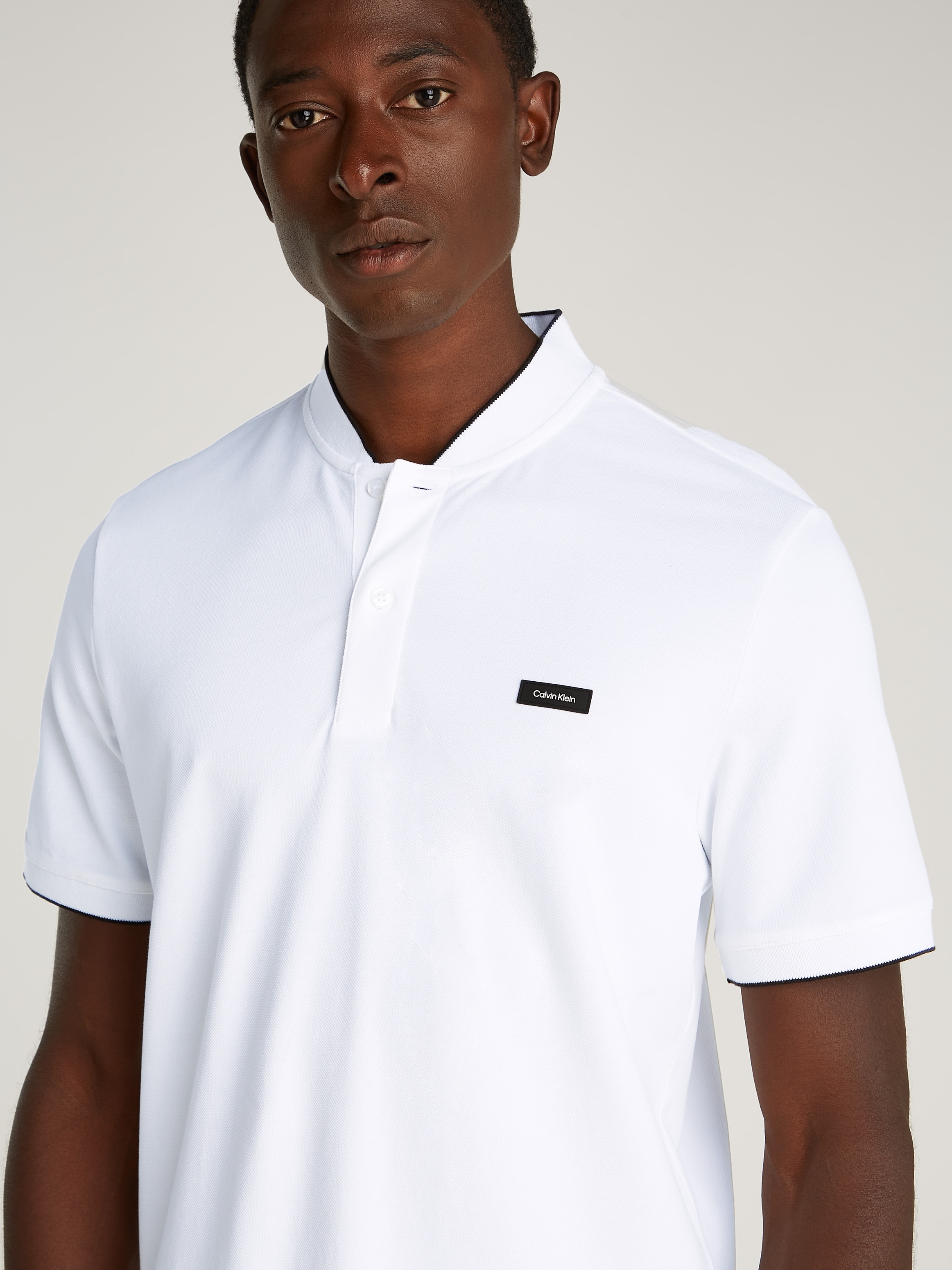 Calvin Klein Polo »STRETCH PIQUE STAND COLLAR POLO« mit kontrastfarbenen Kanten