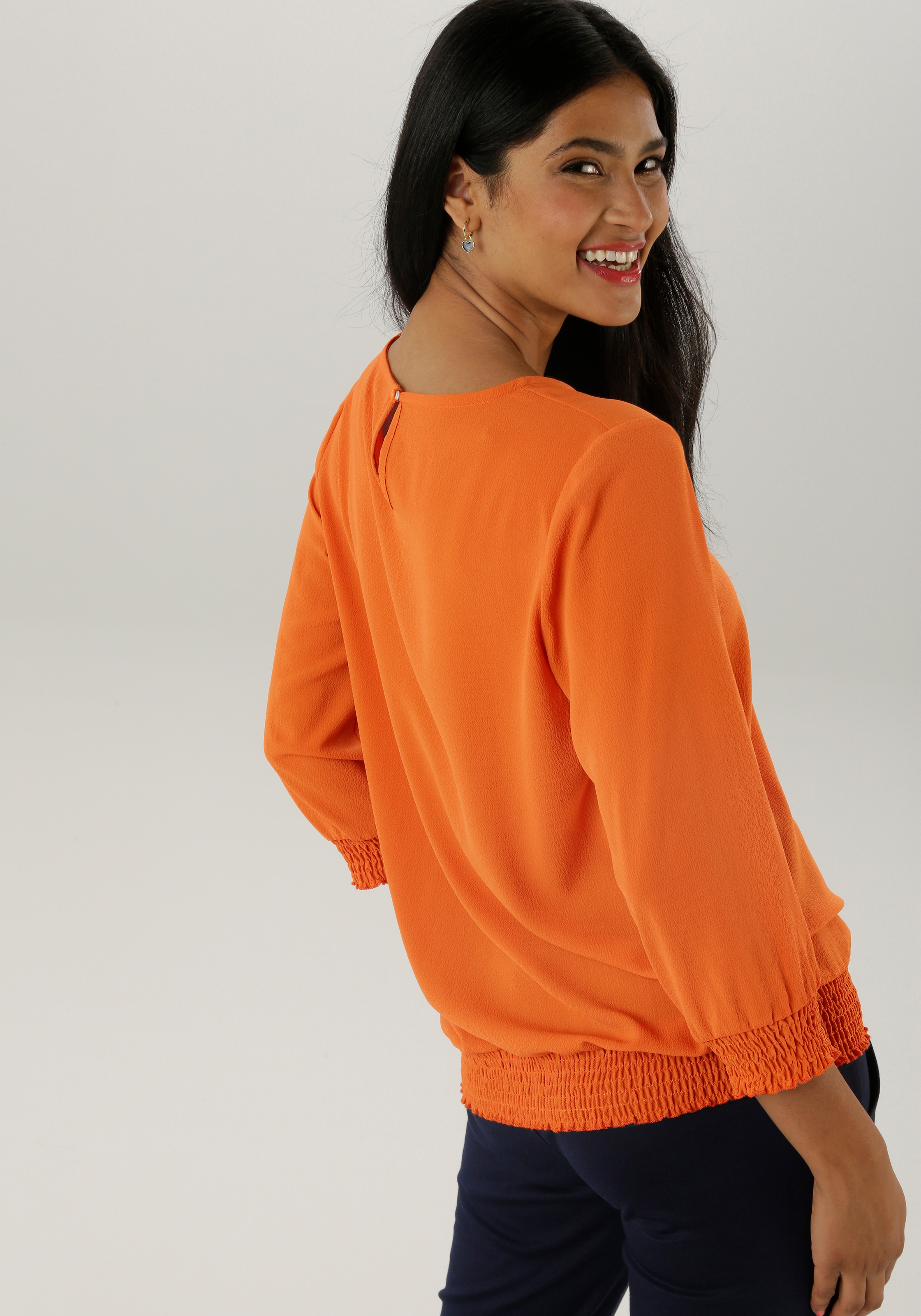 Aniston SELECTED Schlupfbluse mit Smokbündchen und allover Blumenmuster