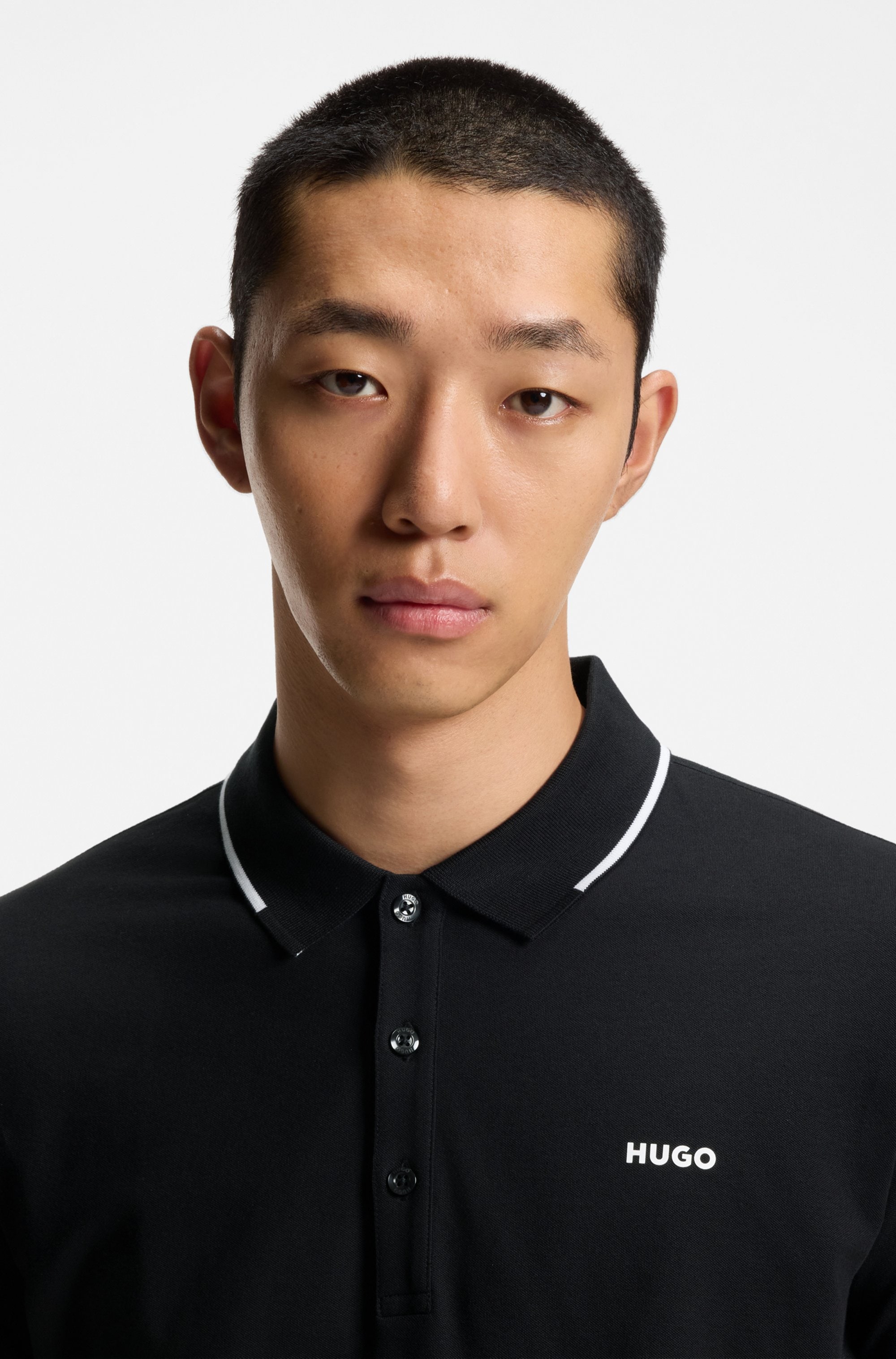 HUGO Polo »Dinoso« col avec bande contrastée, slim fit, impression logo