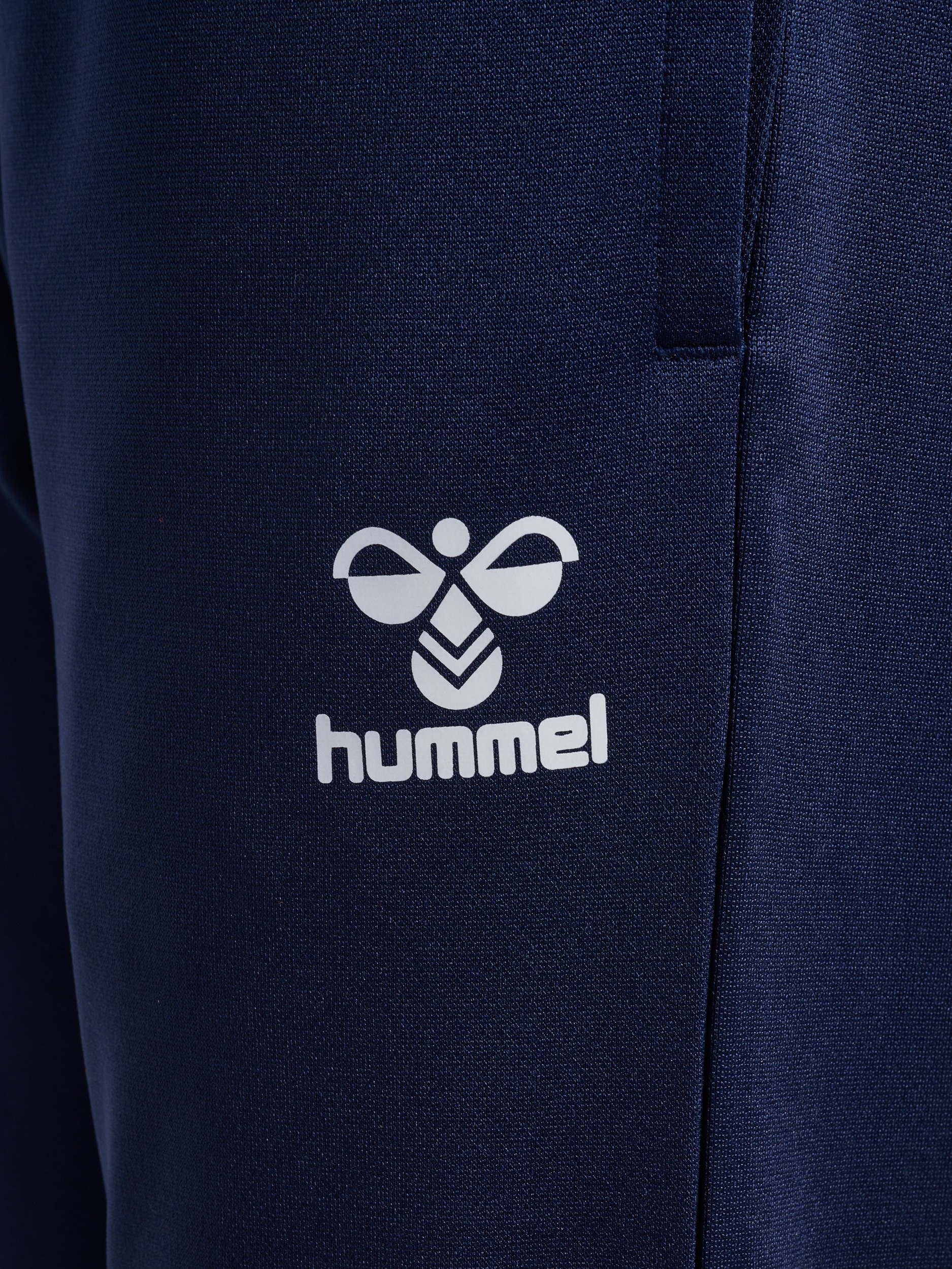 hummel Trainingshose »HMLESSENTIAL TRAINING PANTS KIDS«  mit BEECOOL® Technologie, aus Interlock-Material
