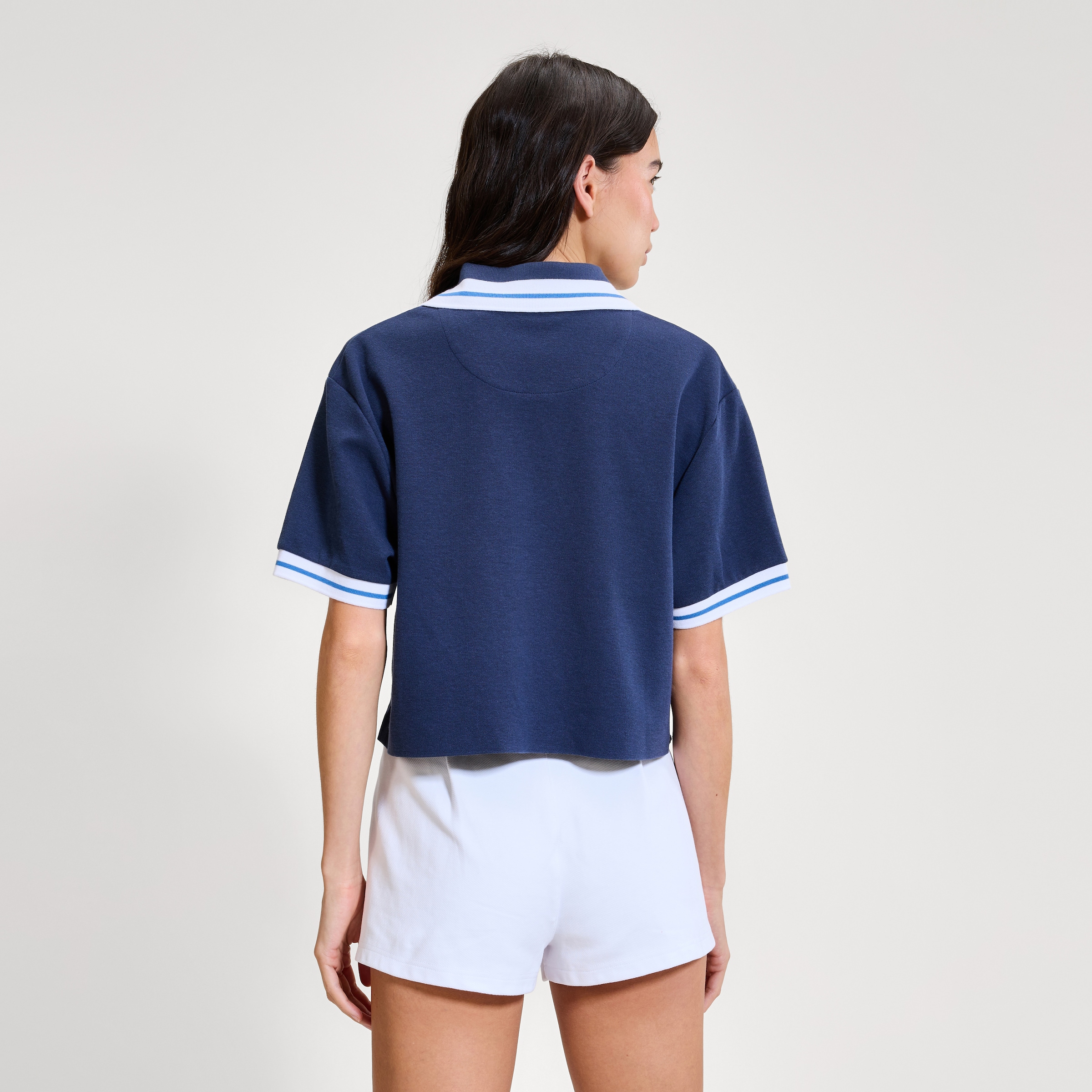 Ellesse Polo »FERNIE POLO SHIRT« à manches courtes, avec col polo et encolure en V, coupe sportive