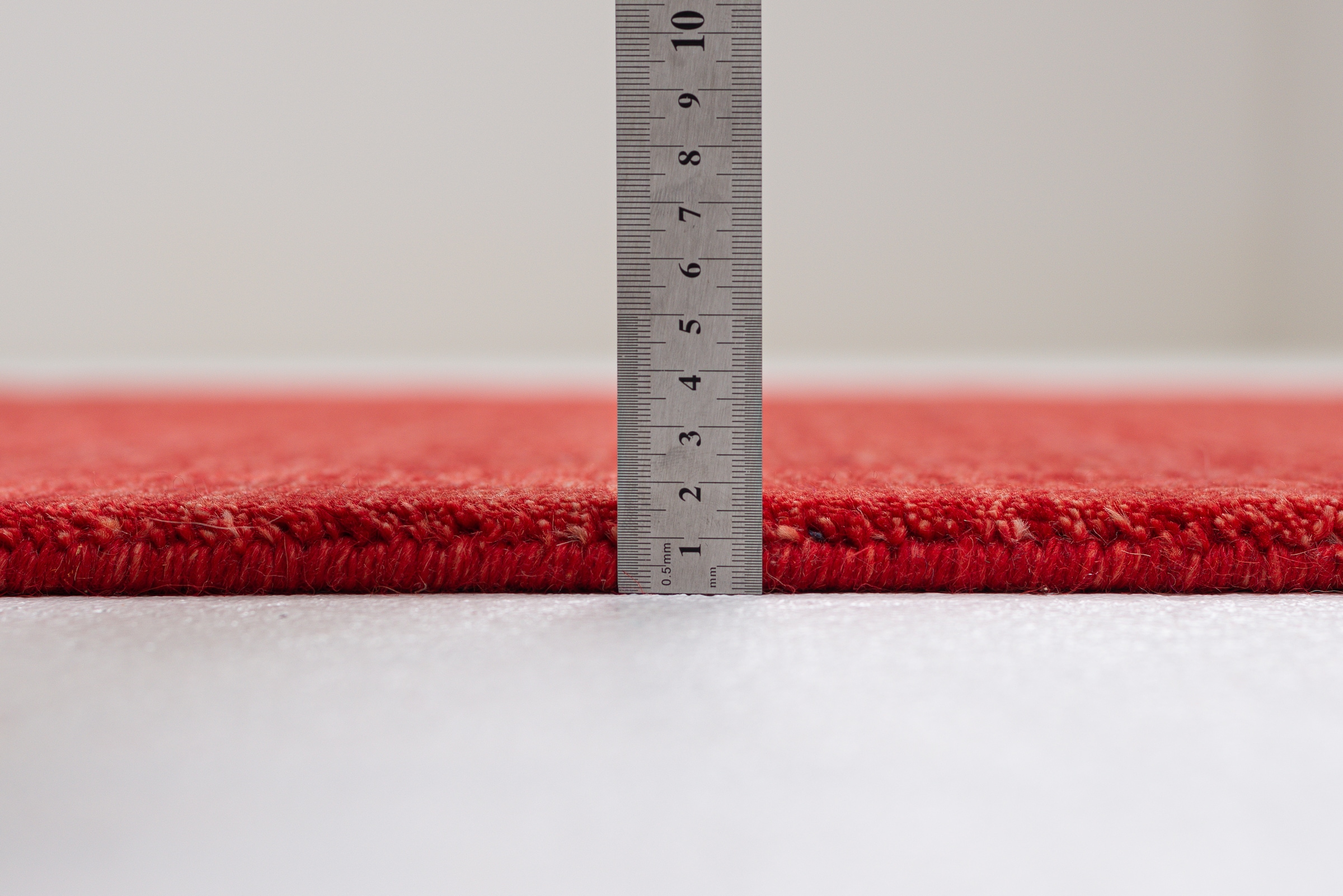 THEKO Tapis en laine »Holi« Rectangulaire 13 mm Höhe Uni-Farben, leicht meliert, reine Wolle, handgewebt mit Knüpfoptik