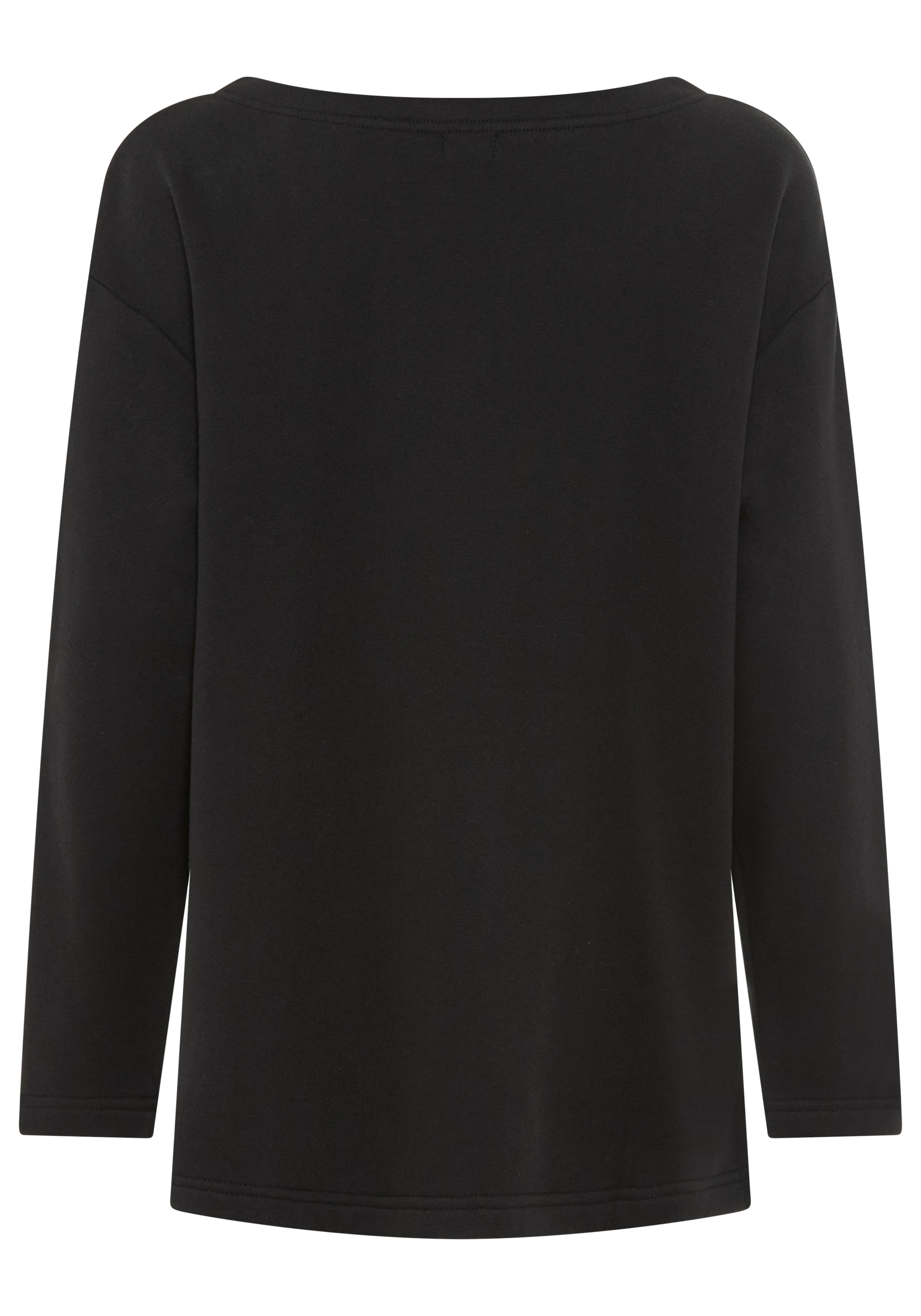 Laura Scott Sweater , Lässig-weiter Sweater mit komfortabler Passform und Seitenschlitzen.
