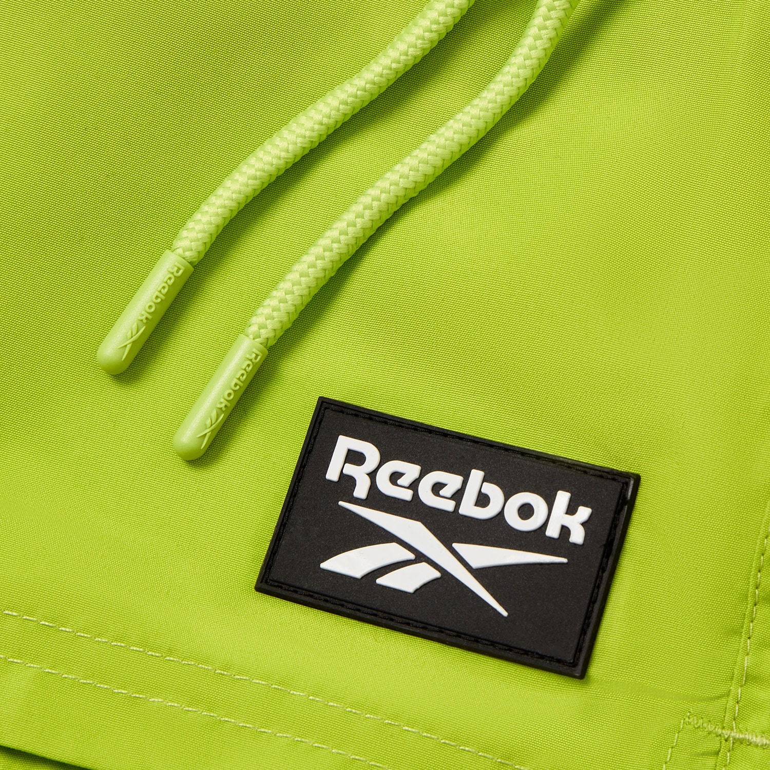 Reebok Short de bain »Ace« mit kleinen Seitenschlitzen, Eingriff-Taschen seitlich