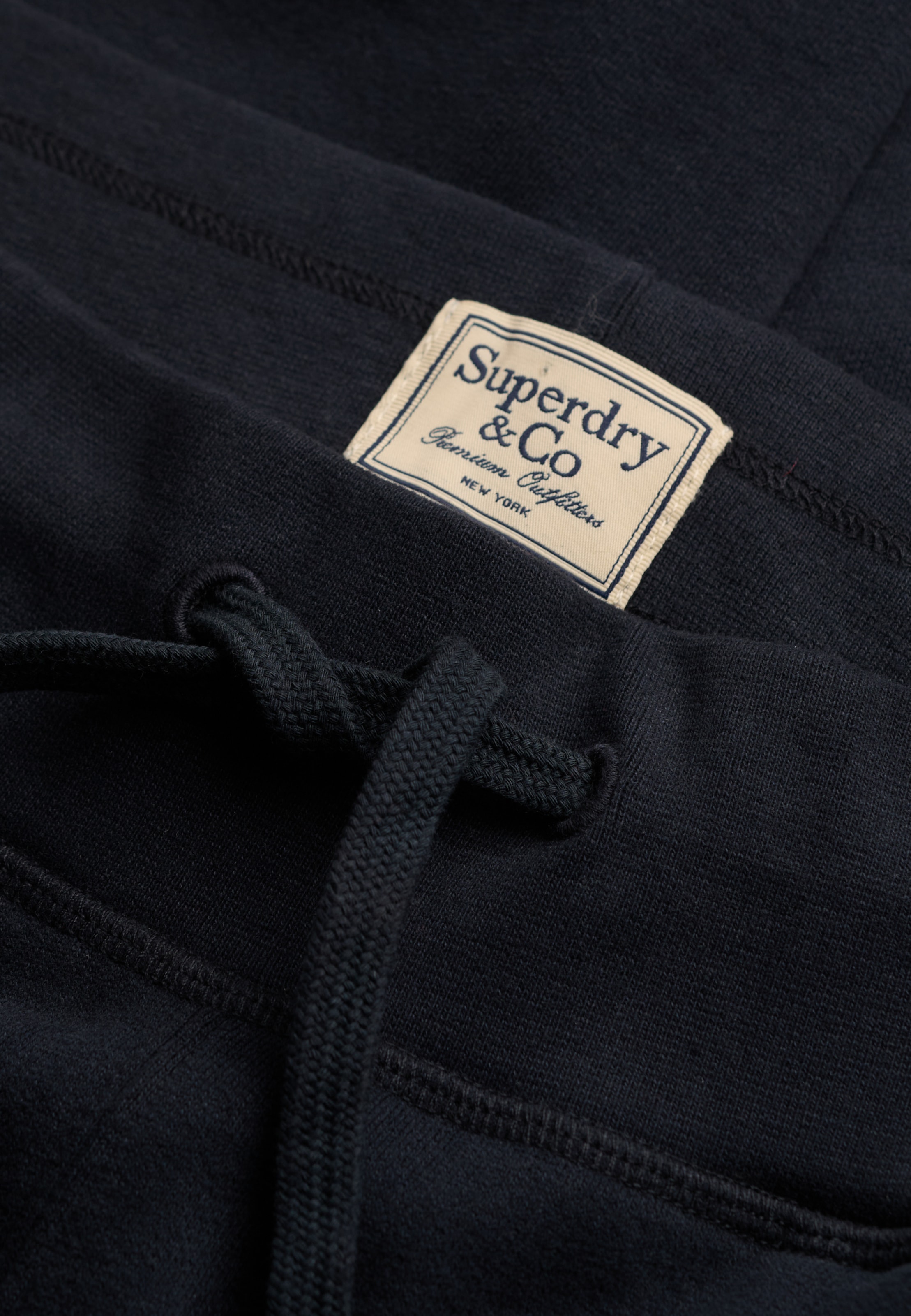 Superdry Pantalon sweat »ESSENTIAL COMPANY LOGO JOGGER«  mélange coton, coupe décontractée