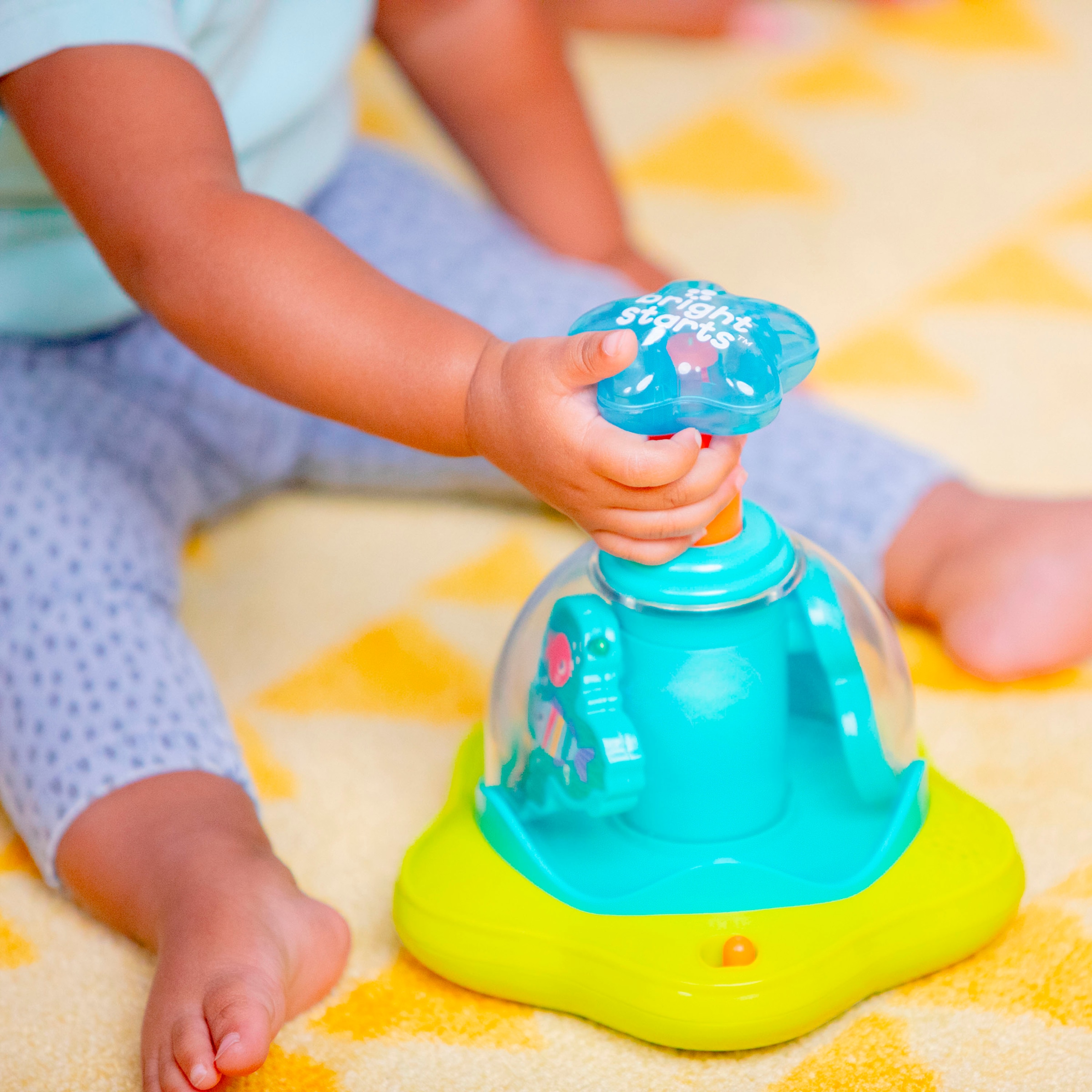 Bright Starts Kreisel »Press & Glow Spinner™« mit Licht und Sound