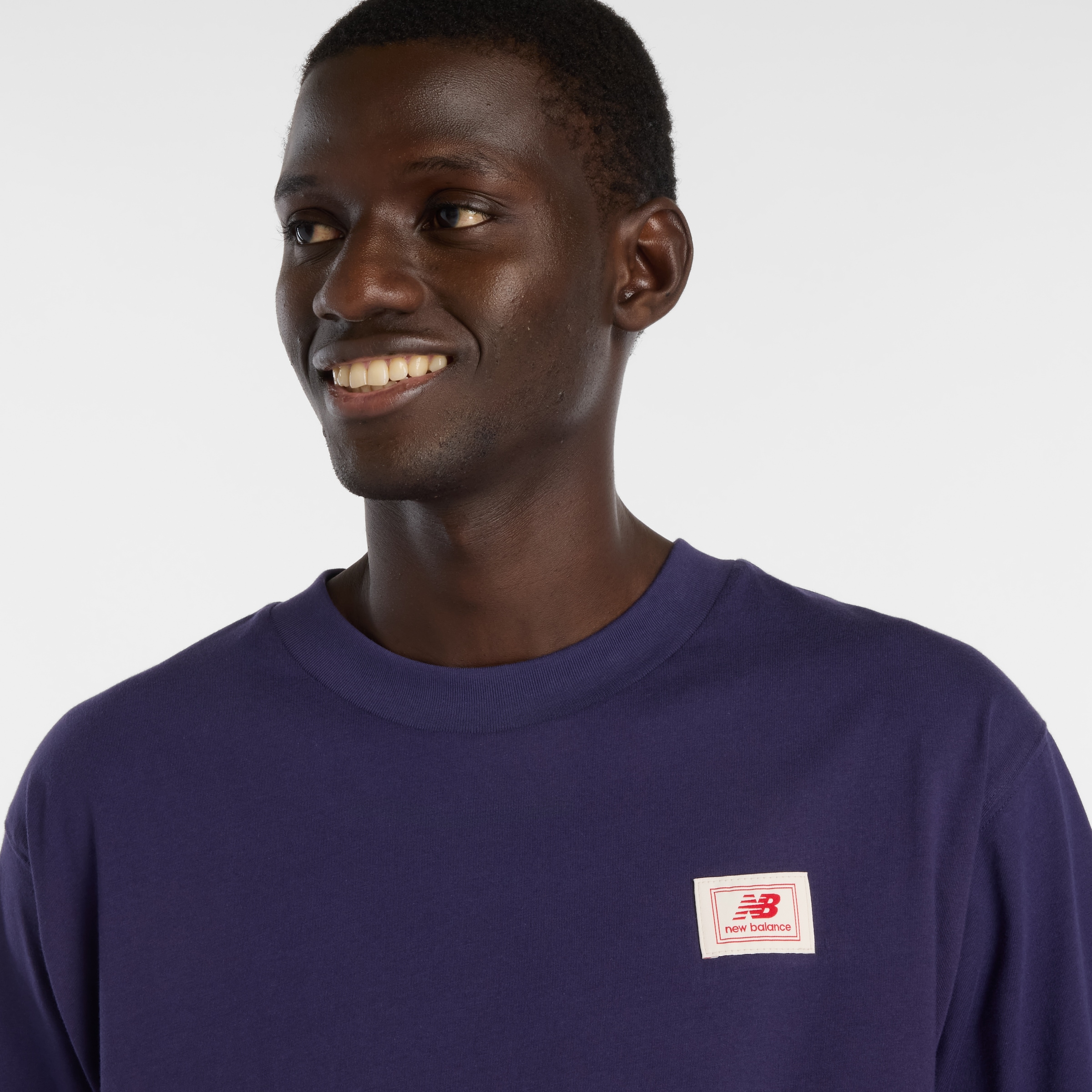 New Balance T-shirt »WOVEN LABEL T-SHIRT« für sportliche Aktivitäten und Freizeit, sportlicher Stil