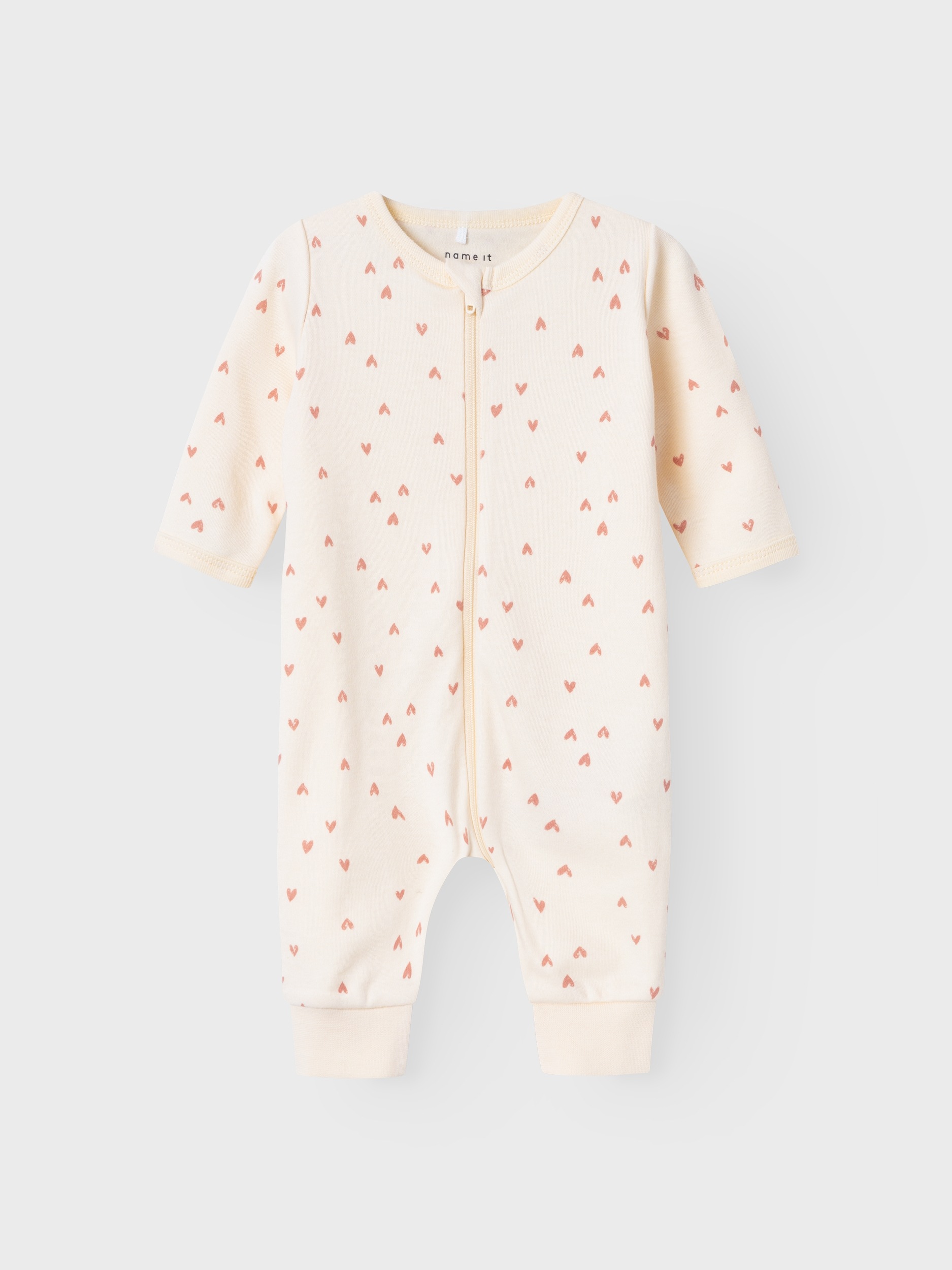 Name It Schlafanzug »NBFNIGHTSUIT ZIP BUTTERCREAM HEARTS NOOS« aus Baumwolle in Jersey-Qualität, Relaxed Fit, mit Reissverschluss