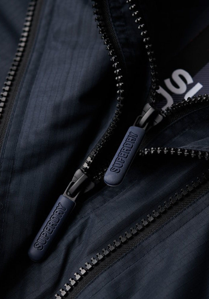 Superdry Veste d'extérieur »HOODED MTN WINDBREAKER JACKET« mit Kapuze