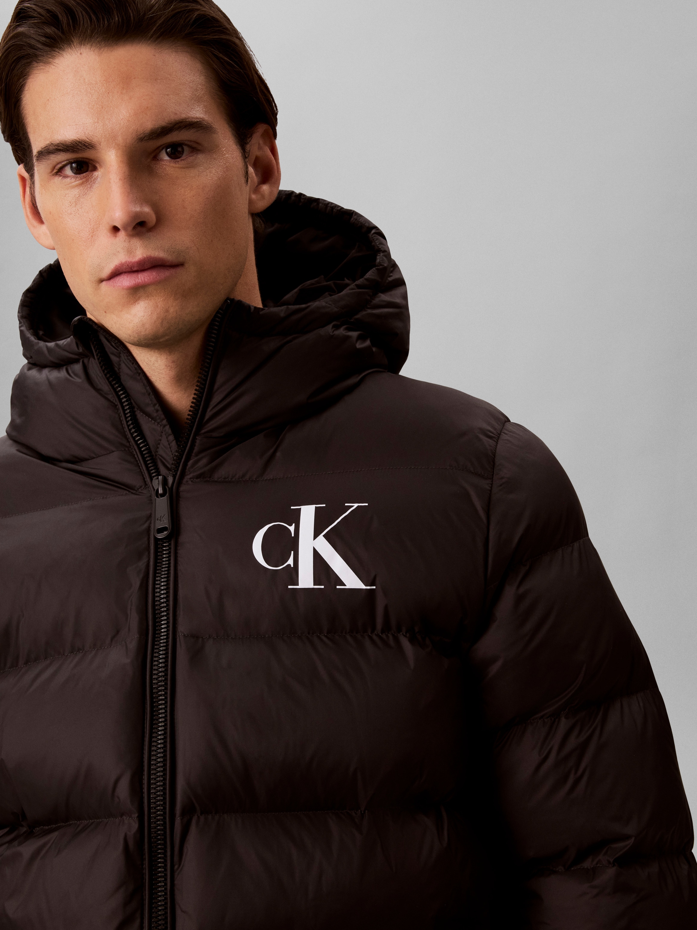 Calvin Klein Jeans Veste matelassée avec capuche Fermeture éclair 2 directions, coupe régulière, impression logo