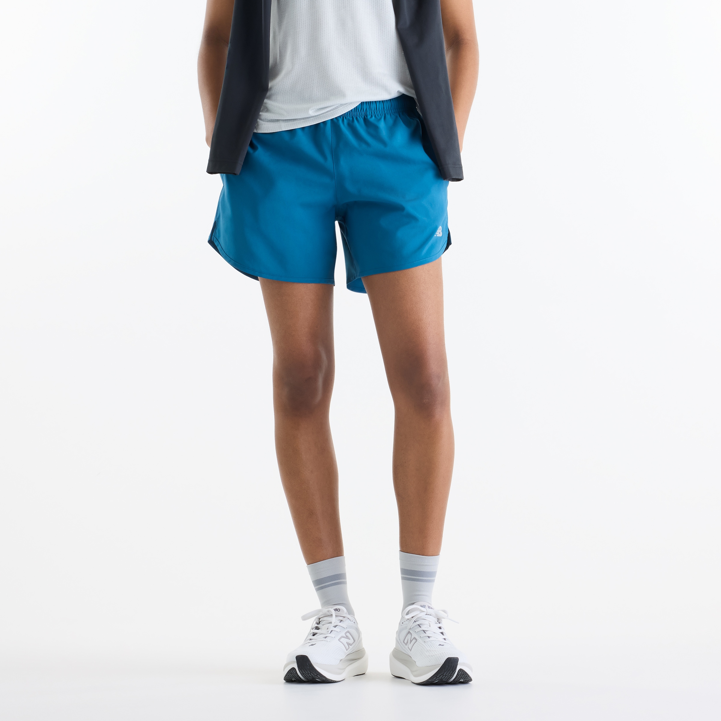 New Balance Short de course »SPORT ESSENTIAL SHORT 5«  avec poches latérales, en matière stretch, respirant