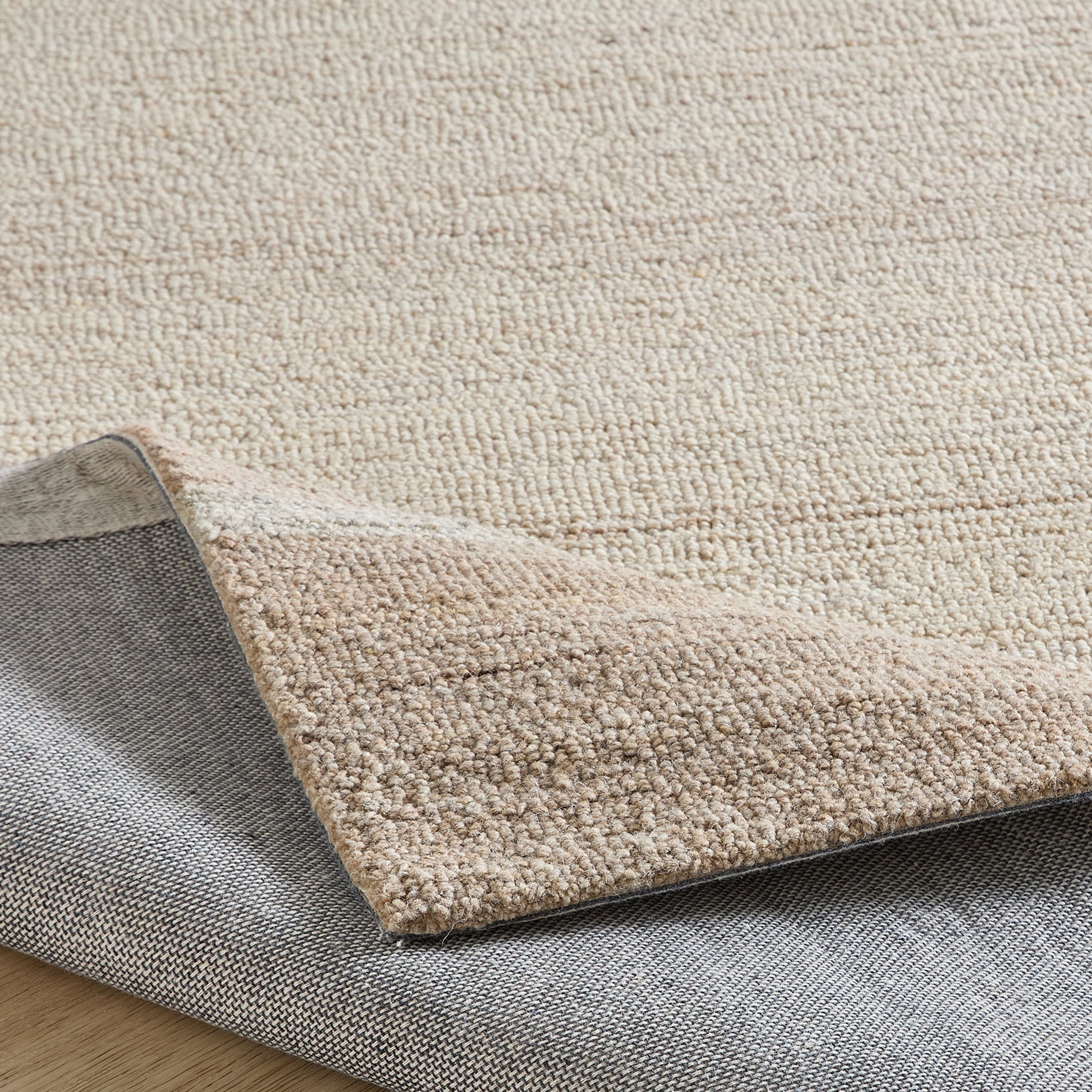 THEKO »Origin Loop 5« Rectangulaire 10 mm Höhe fait main au tuft, pure laine vierge, uni, avec bordure