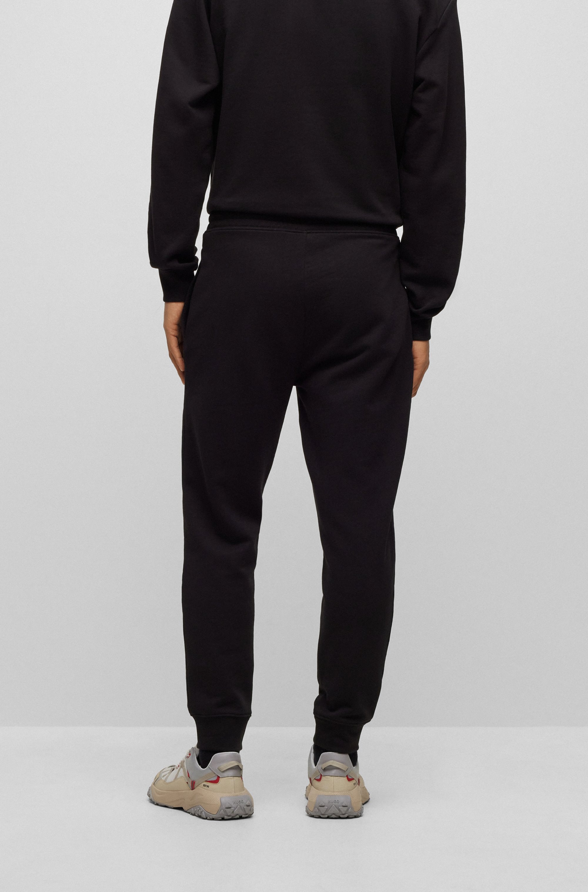 HUGO Pantalon sweat »Dutschi«  Regular Fit, taille élastique, impression logo HUGO