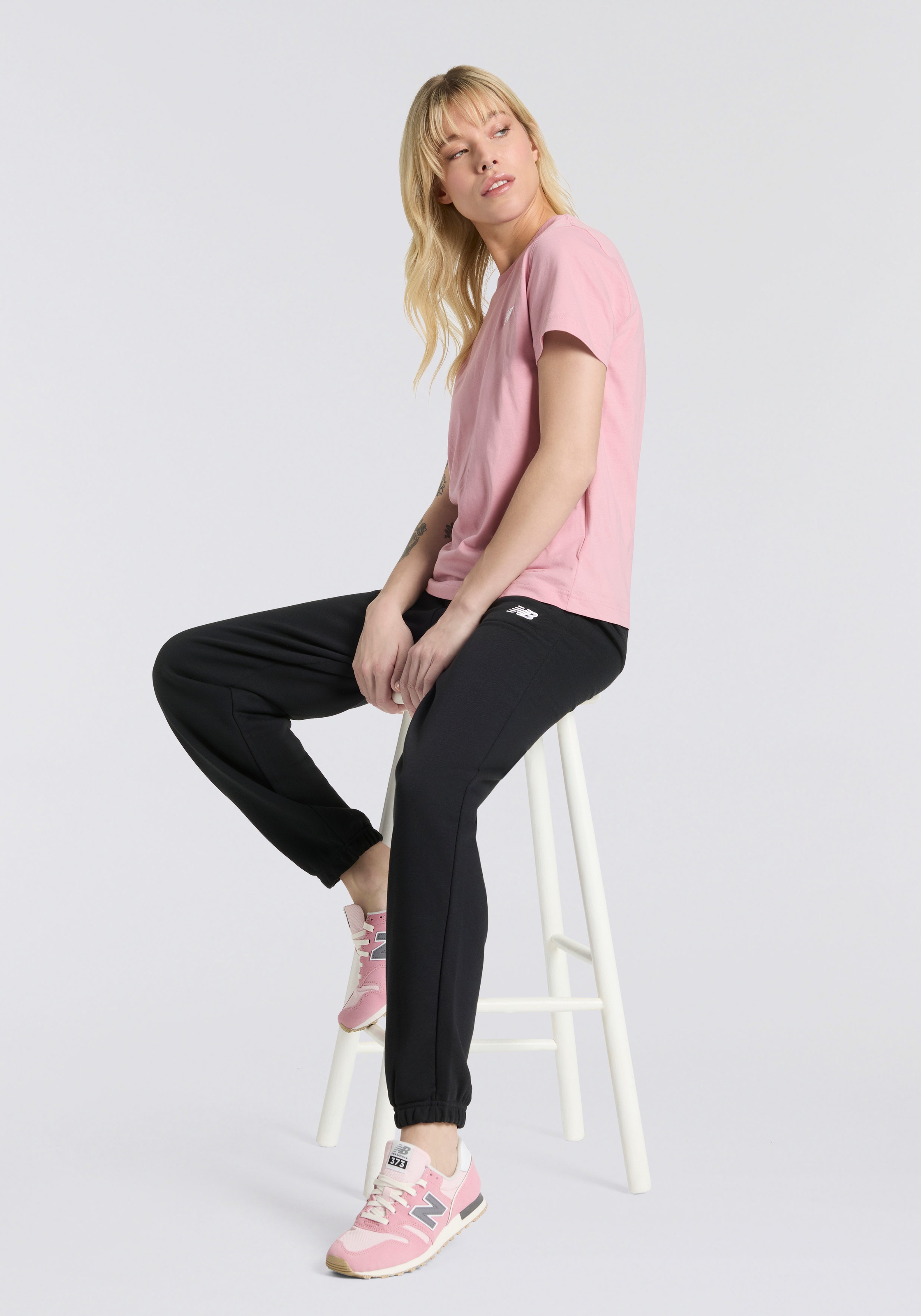 New Balance Pantalon de jogging »SPORT ESSENTIALS FRENCH TERRY JOGGER«  lockere Passform