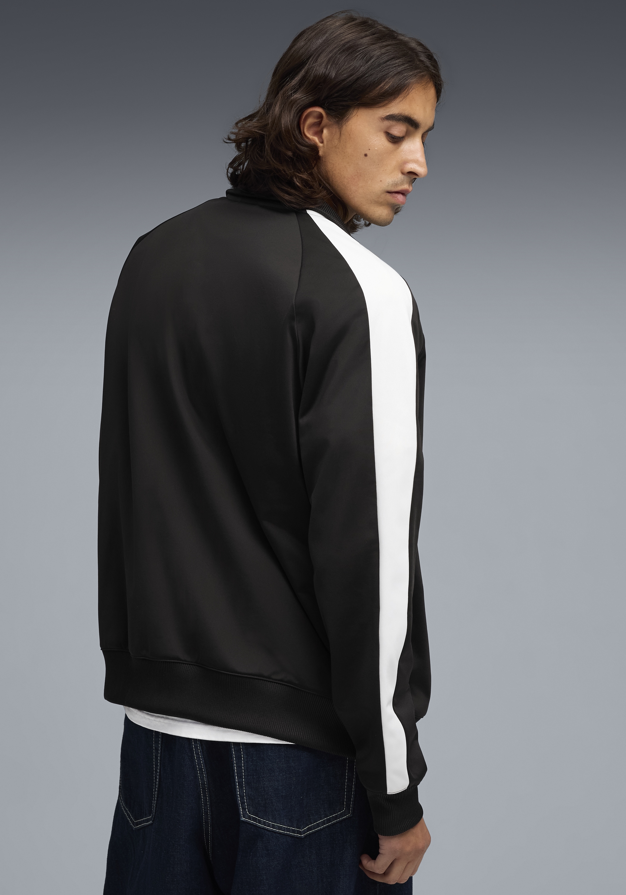 PUMA Trainingsjacke »T7 FOUNDATION POLY TRACK JACKET« ohne Kapuze mit Stehkragen, mit Reissverschlusstaschen, Regular Fit