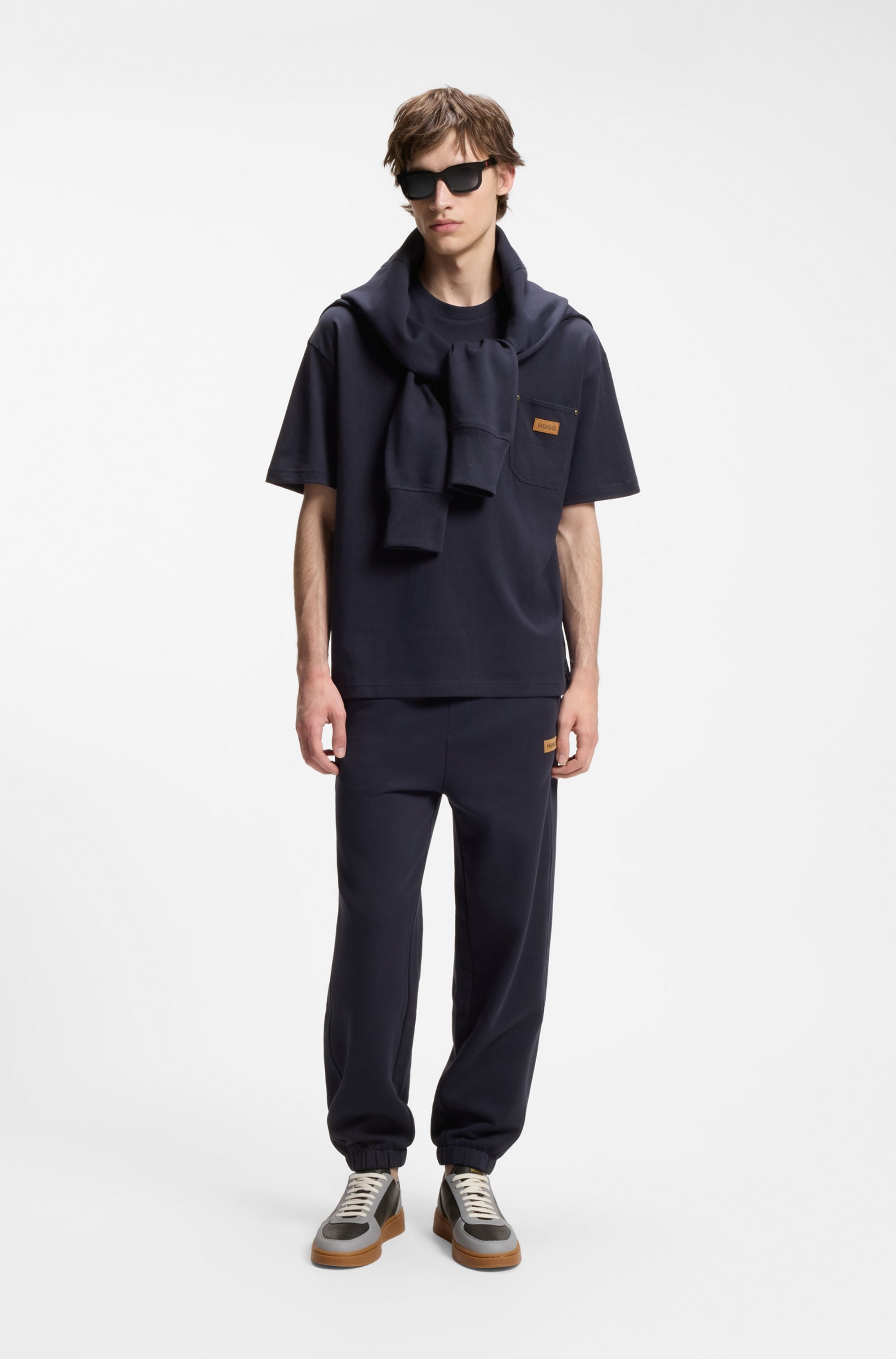 HUGO Sweathose »Nevatro«  Regular Fit, Zierhosenschlitz, elastische Bündchen