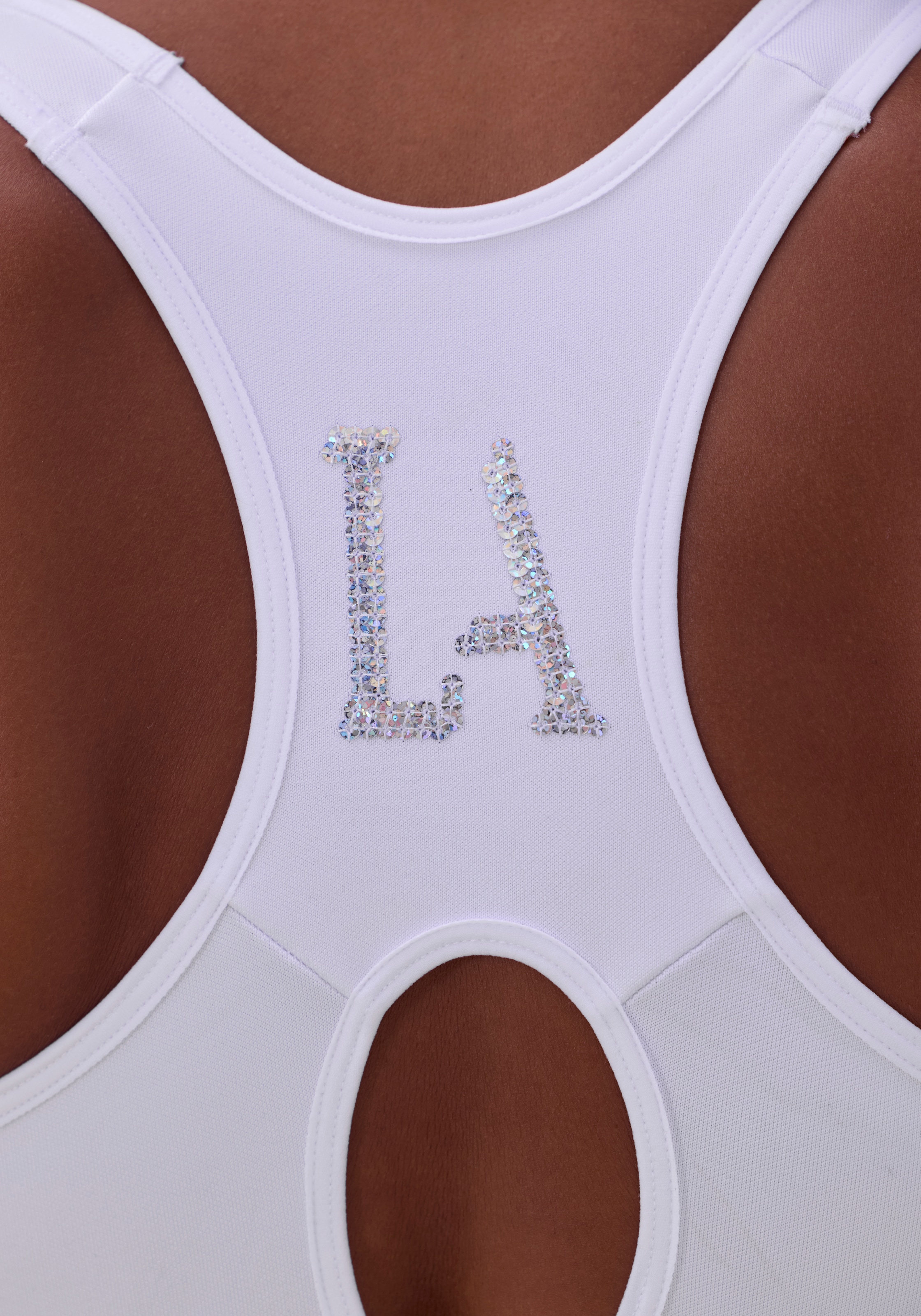 LASCANA ACTIVE Sport-BH mit LA-Buchstaben aus funkelnden Pailletten aus Coolmax-Material