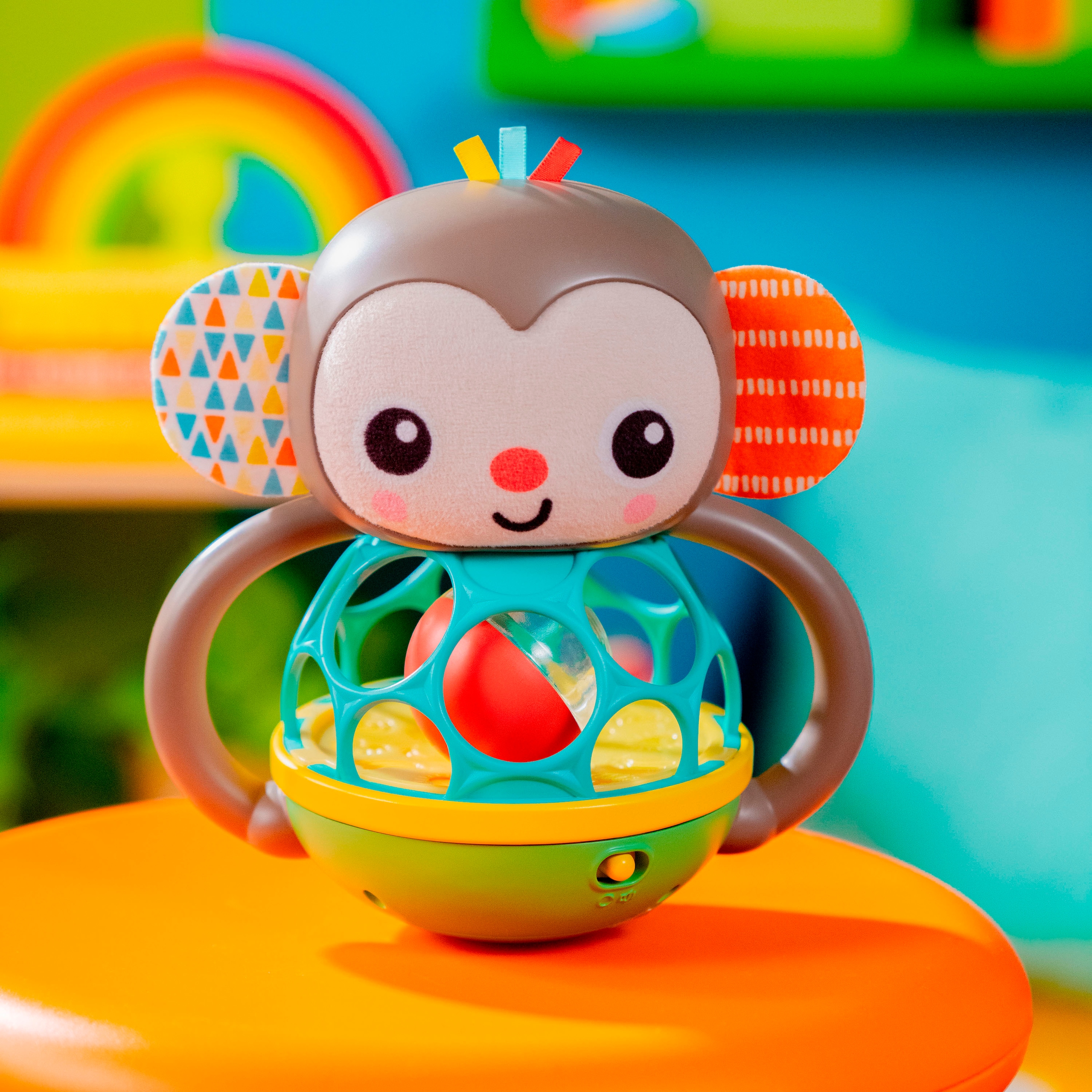 Bright Starts Greifspielzeug »Grab & Giggle Monkey™ Multi-Sensory Toy« mit Sound