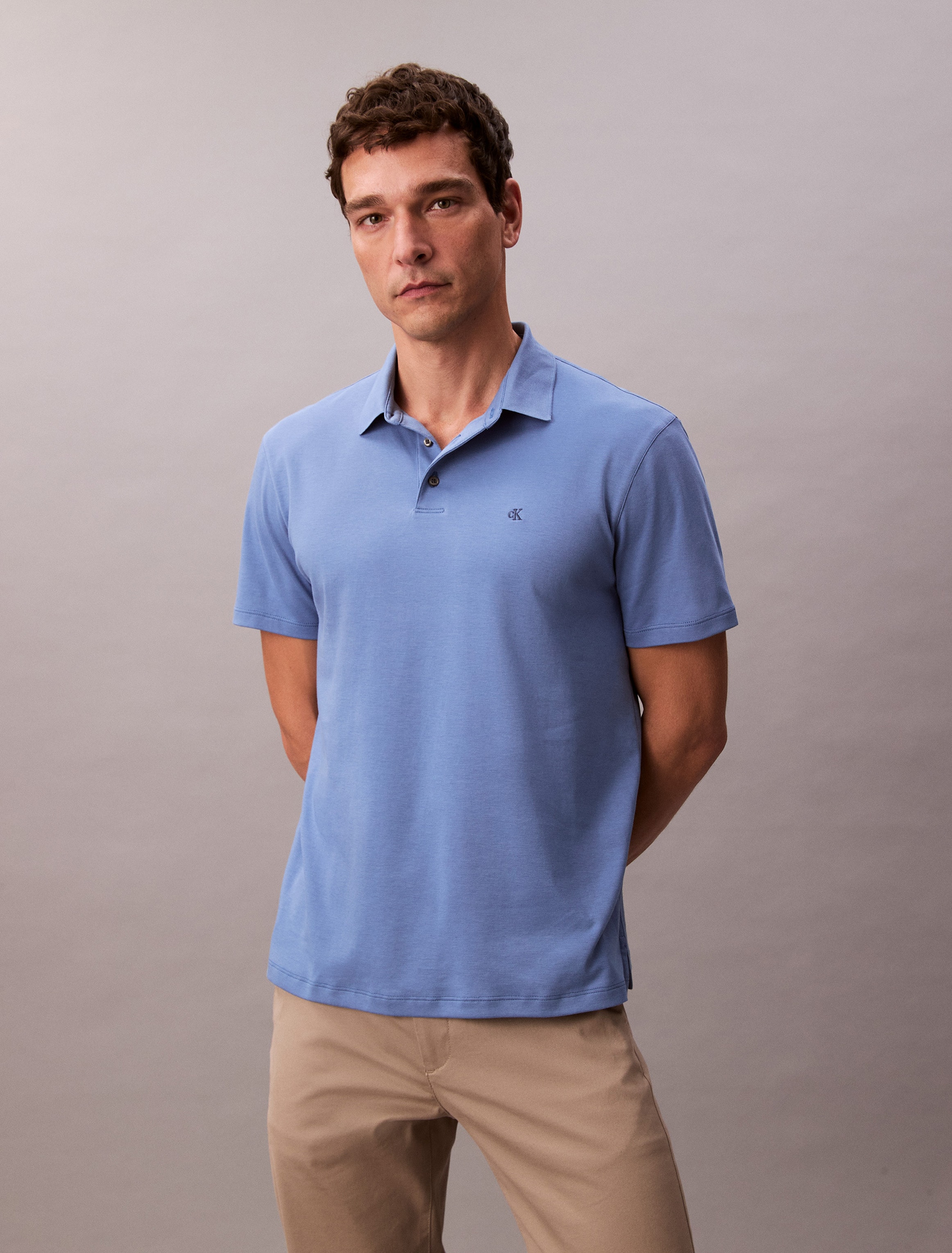 Calvin Klein Poloshirt »SS SUPIMA CHEST EMB POLO« Mit Rundhalsausschnitt