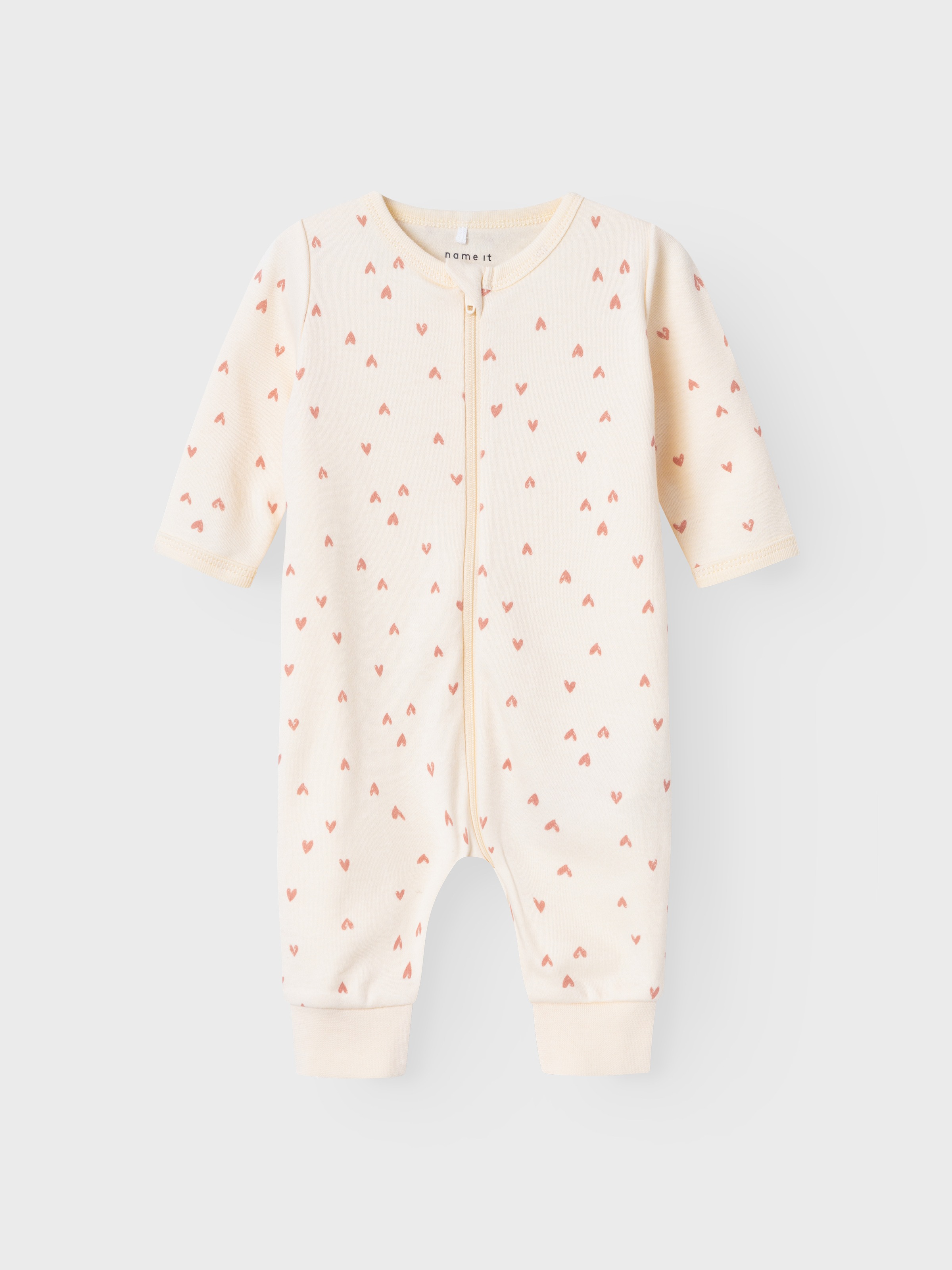 Name It Schlafanzug »NBFNIGHTSUIT ZIP BUTTERCREAM HEARTS NOOS« aus Baumwolle in Jersey-Qualität, Relaxed Fit, mit Reissverschluss