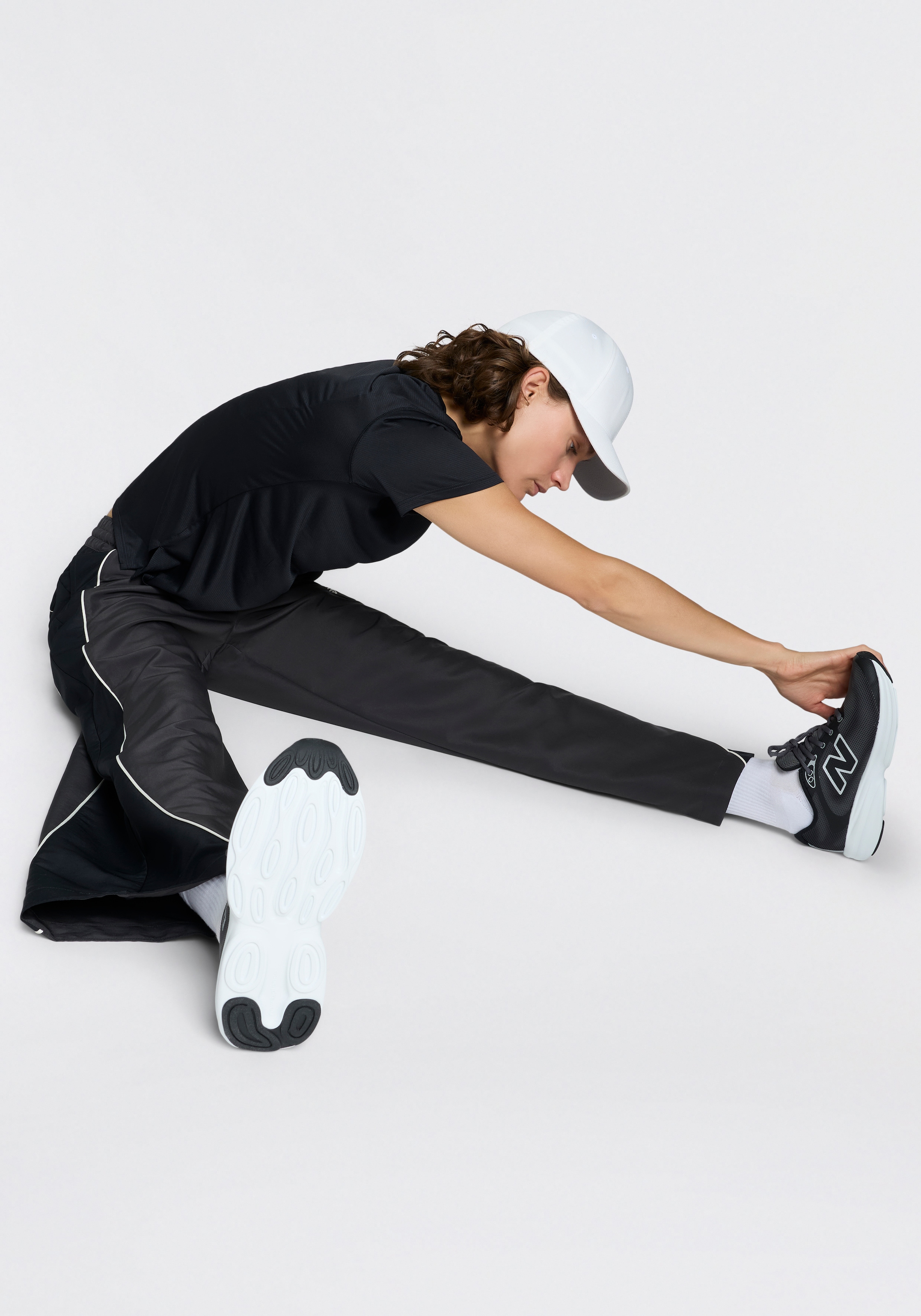 New Balance Pantalon de survêtement »TRACKSIDE WOVEN PANT«  pour adultes, coupe confortable, forme normale/droite