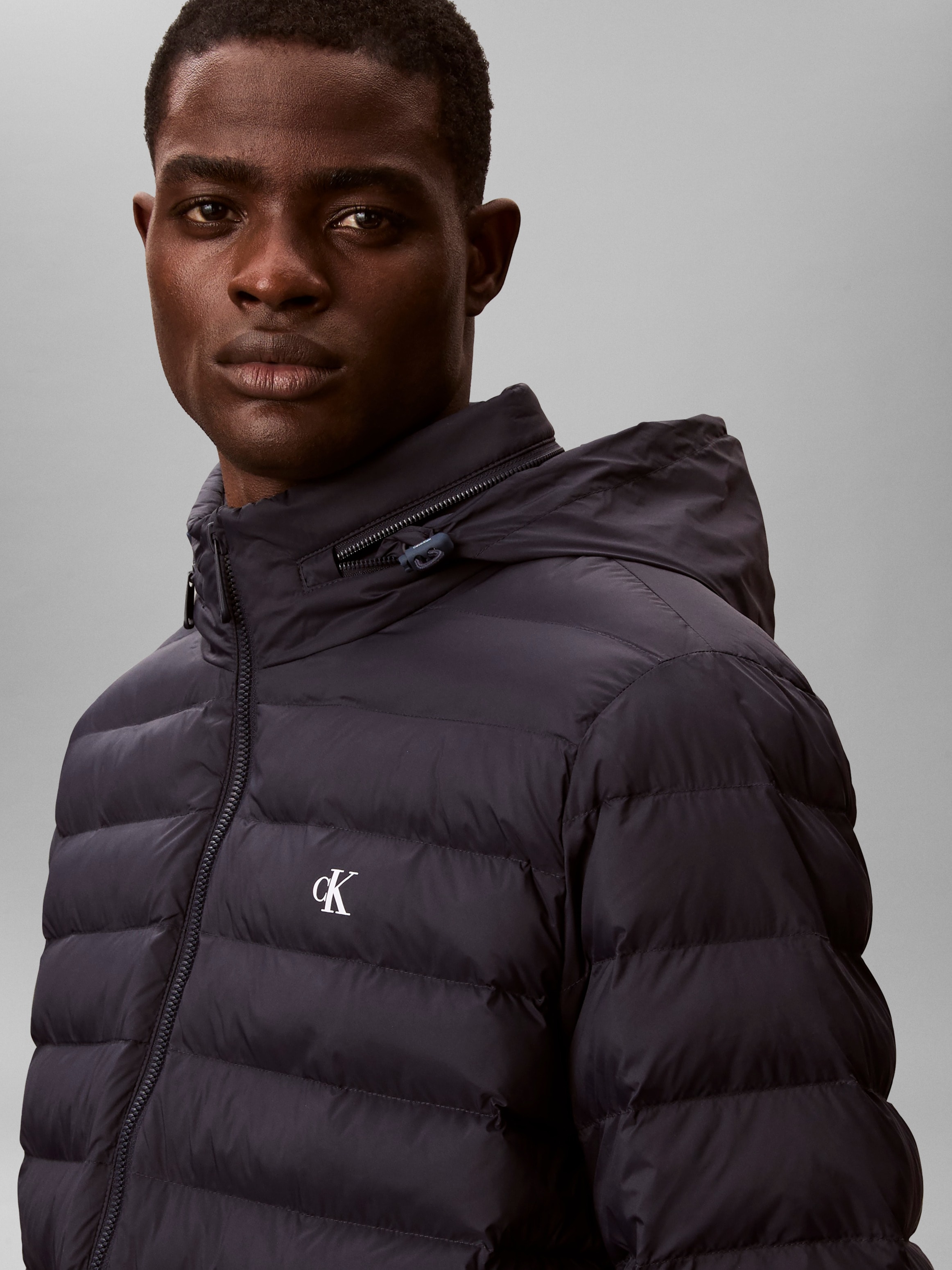 Calvin Klein Jeans Steppjacke »LS NYLN MD WT HDD  F« mit Kapuze Regular fit mit Kapuze im Kragen