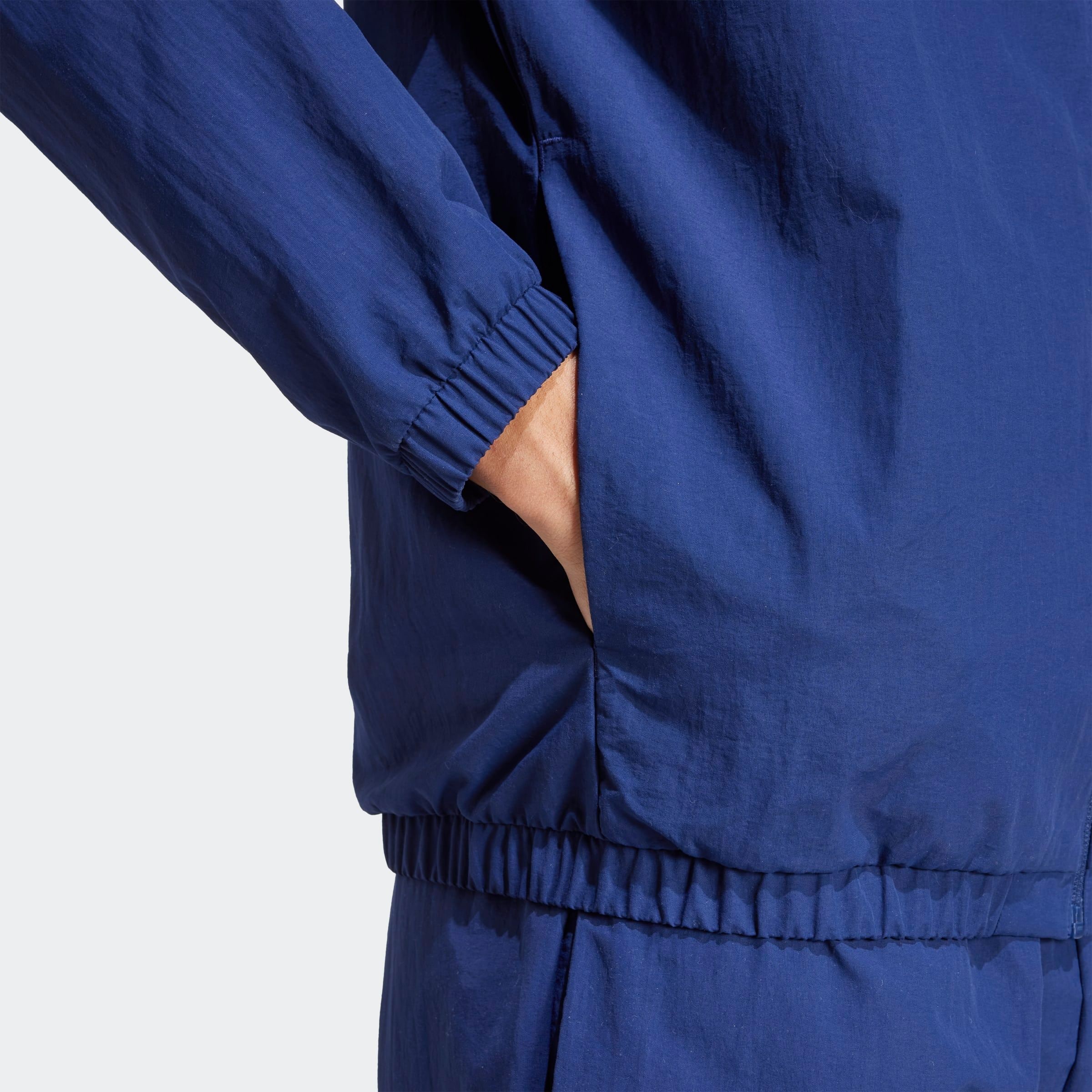 adidas Sportswear Coupe-vent »ESSENTIAL MIT KLEINEM LOGO«