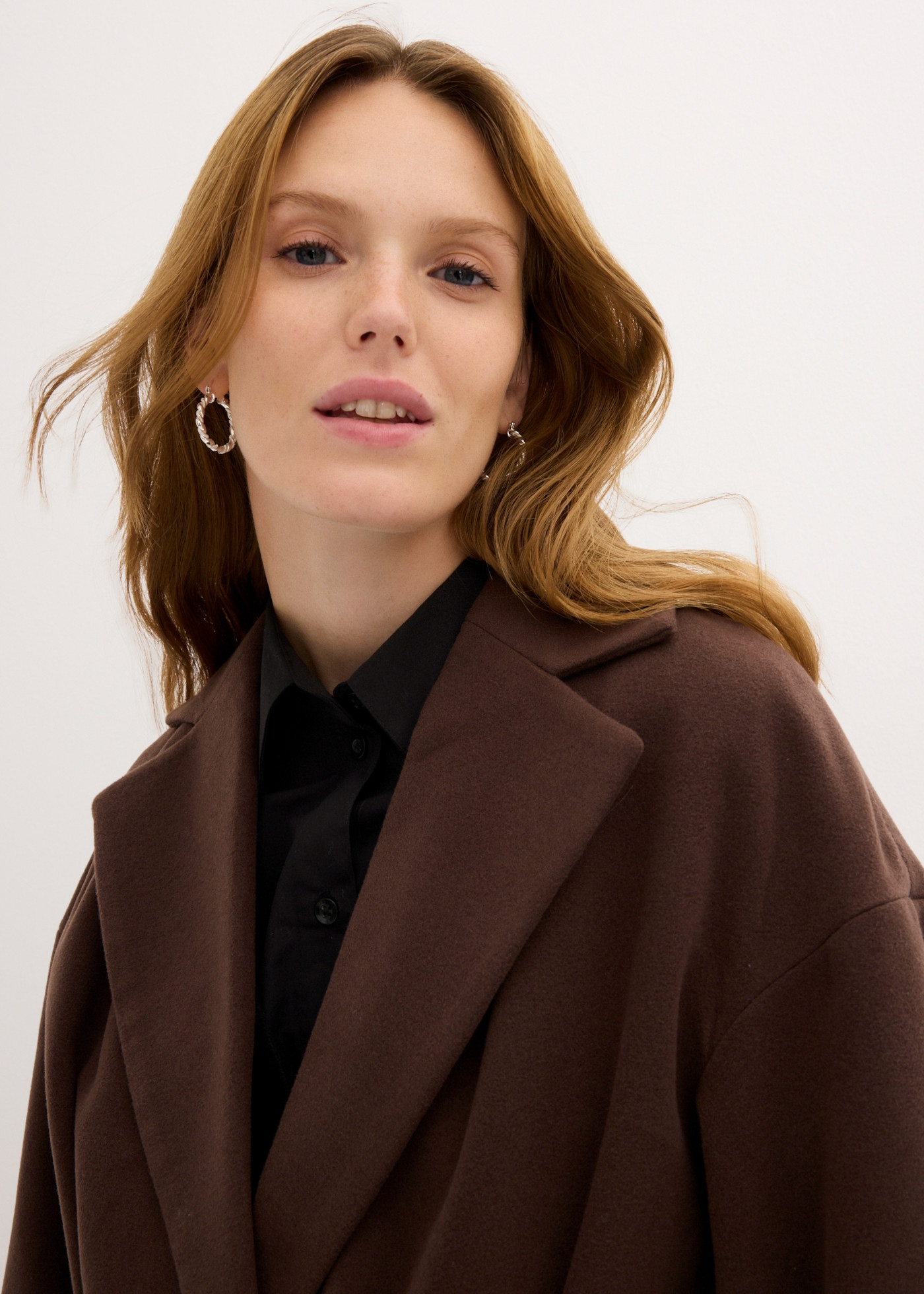 bonprix Manteau d'hiver aus Wollimitat, mit Taschen, lässig geschnitten, elegant