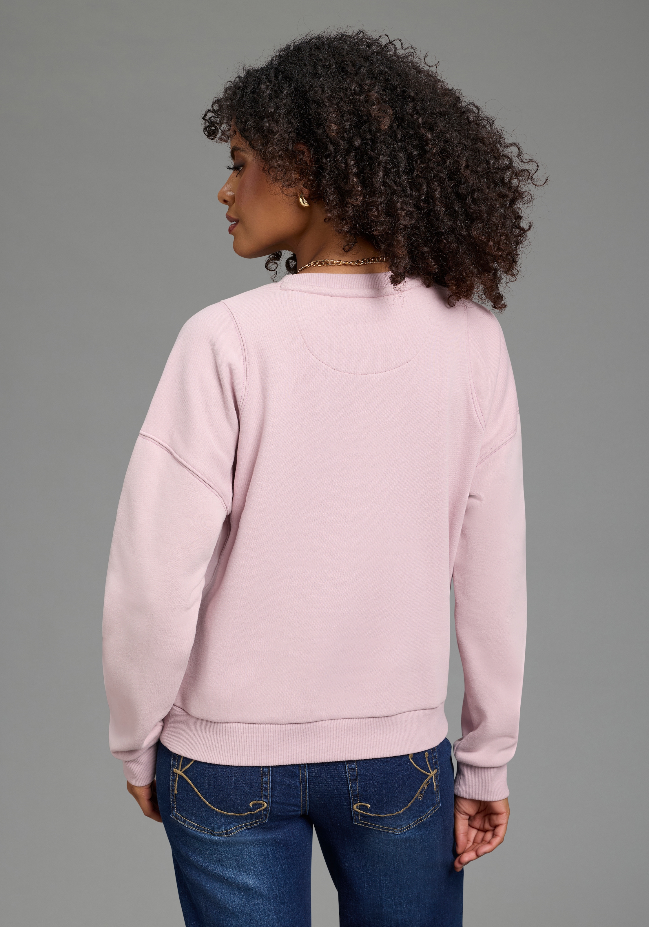 KangaROOS Sweat-shirt , avec impression en application, coupe ample, longueur aux hanches
