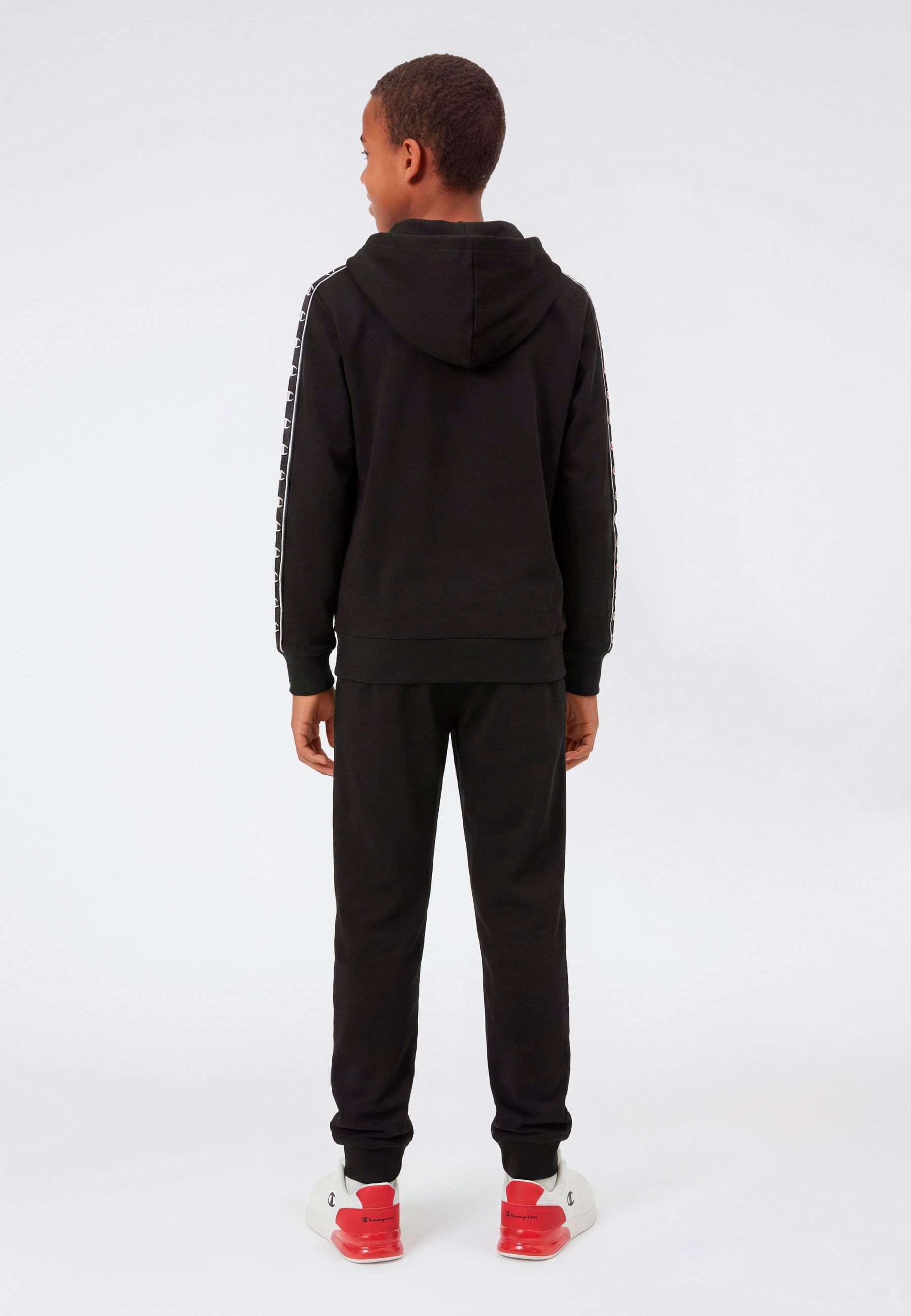 Champion Jogginganzug »Sport inspired Hooded Full Zip sweatsuit« 2 tlg. für Kinder, mit Kapuze, mit durchgehendem Reissverschluss