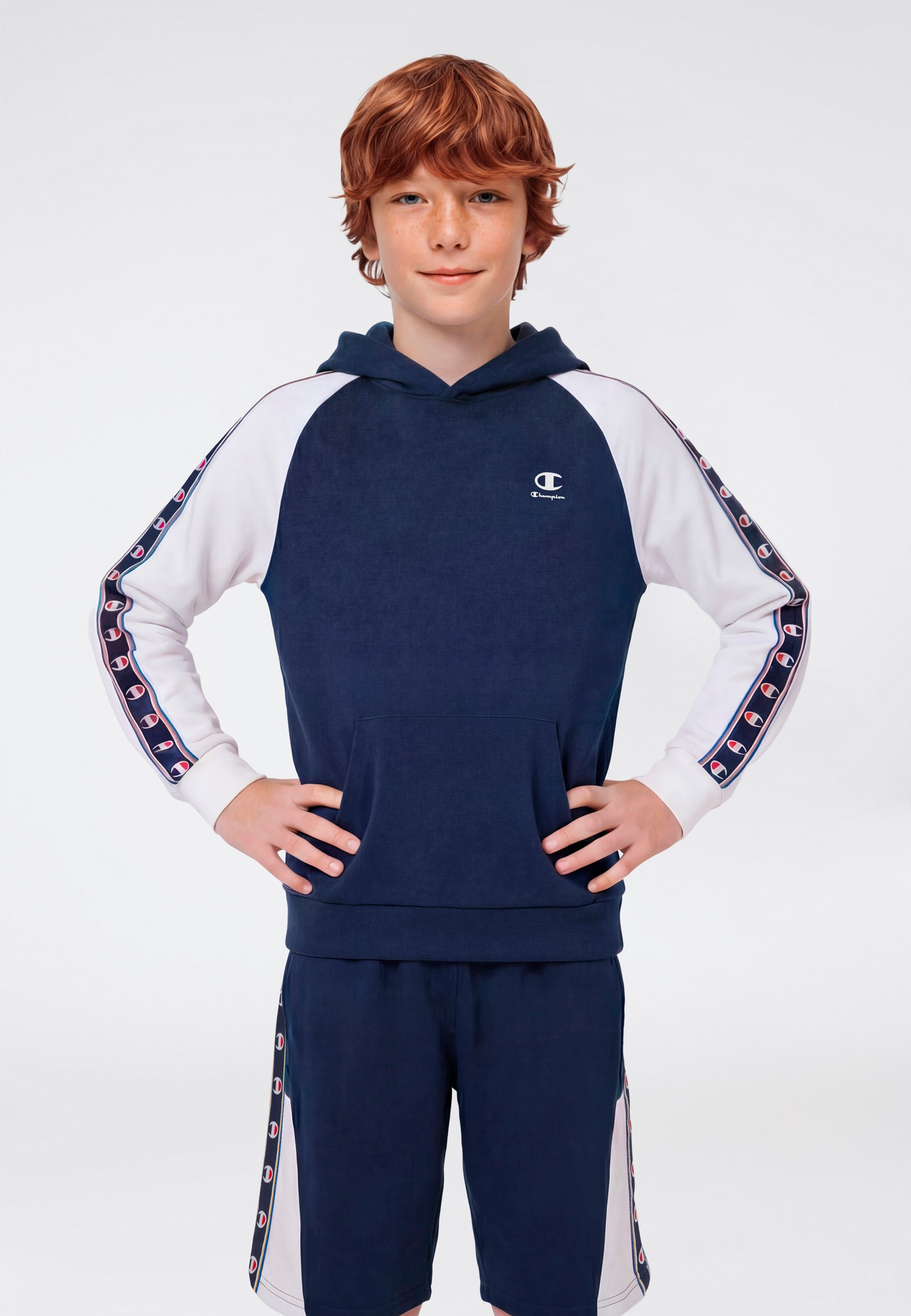 Champion Kapuzensweatshirt »Sports-inspired Terry Hoodie with Tape detailing«, für Kinder, sportlich inspiriert, mit Kapuze, normale Schnittform

