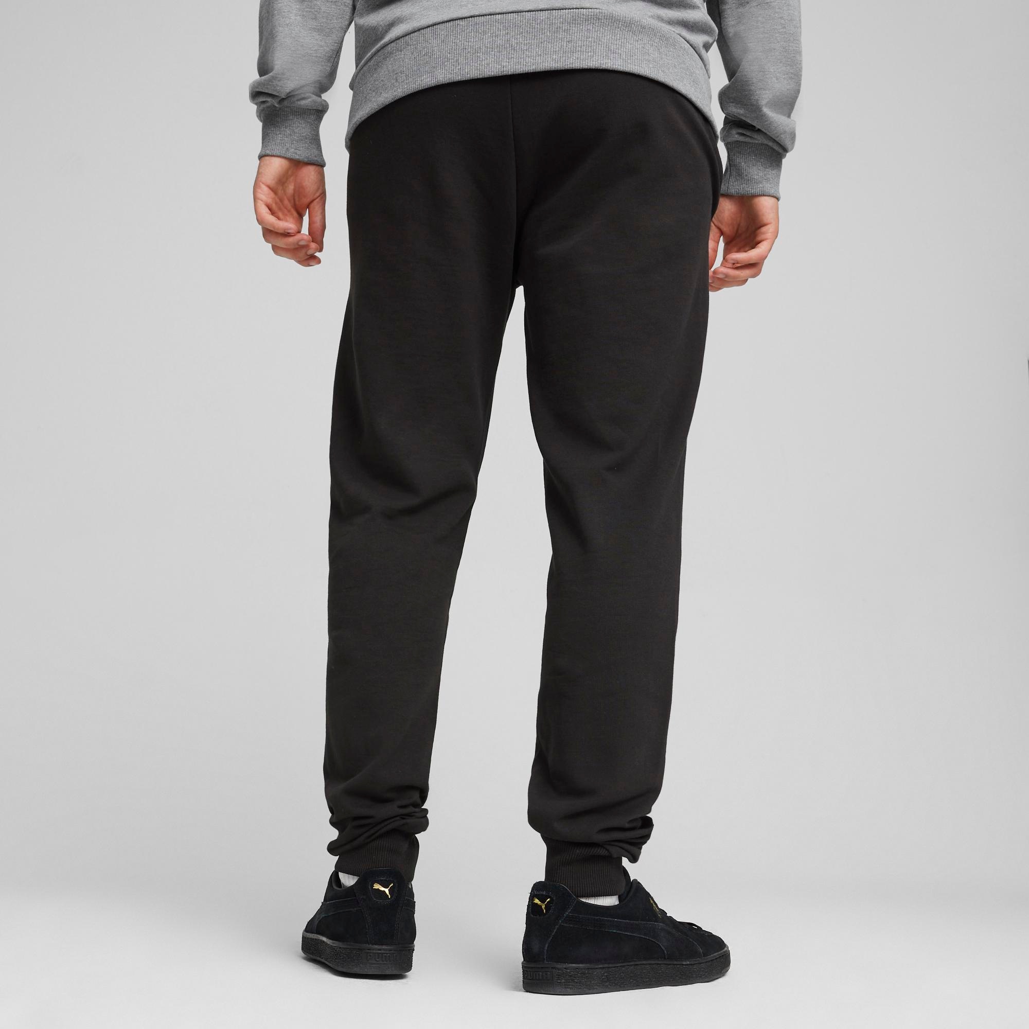 PUMA Pantalon de survêtement »TEAMGOAL CASUALS PANTS«  coupe slim fit, pour football et activités sportives