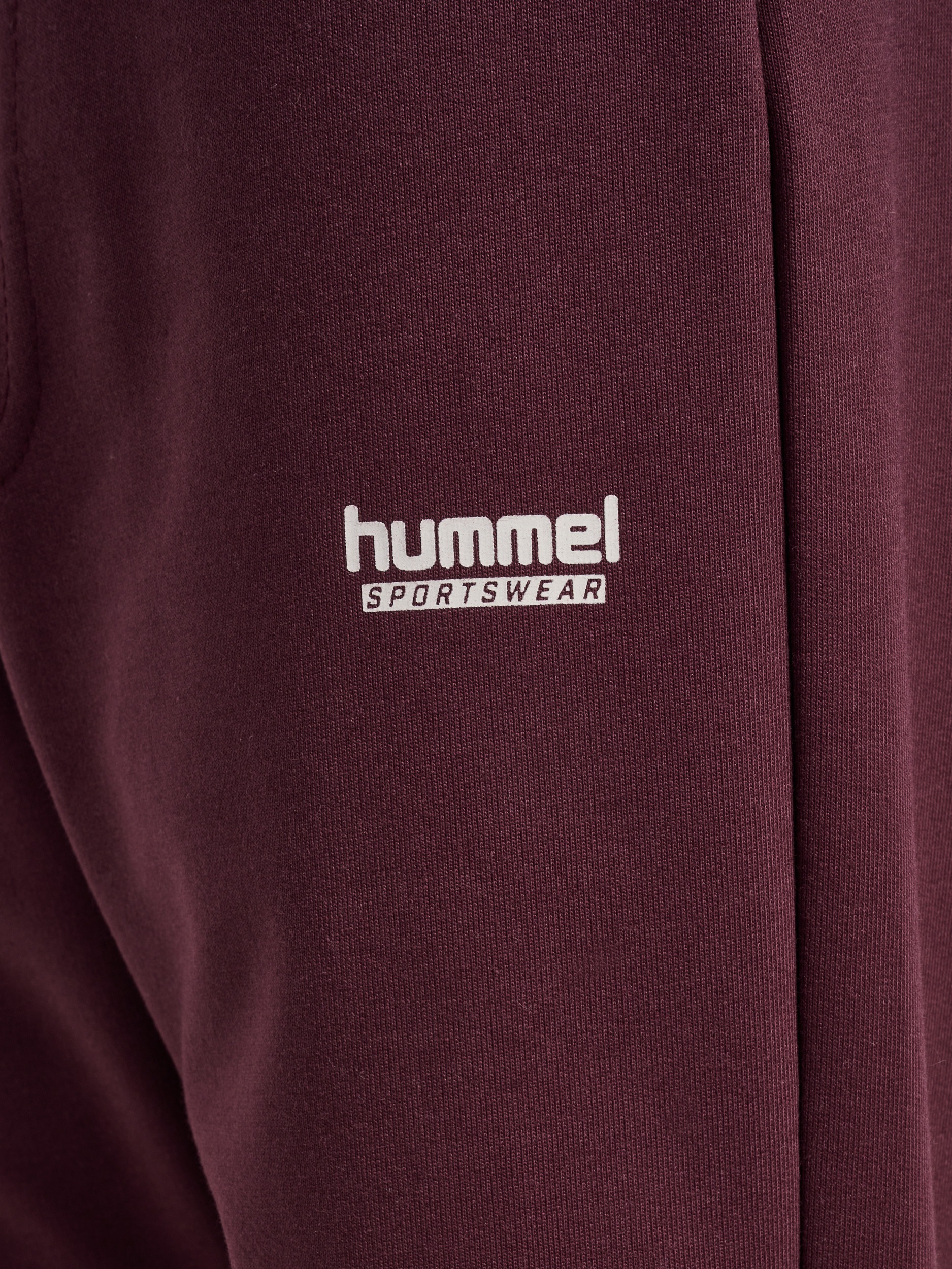 hummel Pantalon de jogging »hmlJR REGULAR ADJ WAIST PANTS«  avec poches latérales zippées, en tissu sweat doux